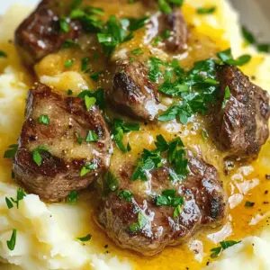 For creamy garlic butter steak bites, you need simple, fresh ingredients. Start with one pound of sirloin steak. Cut it into bite-sized pieces. Season it with salt and pepper to taste. You will also need two tablespoons of olive oil. This will help cook the steak perfectly.