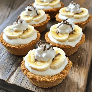 To make No-Bake Mini Banana Cream Pies, gather these simple ingredients: - 1 cup graham cracker crumbs - 4 tablespoons unsalted butter, melted - 2 ripe bananas, sliced - 1 cup cold milk - 1 package (3.4 oz) instant vanilla pudding mix - 1 cup whipped topping (or homemade whipped cream) - 1 teaspoon vanilla extract - Additional banana slices and whipped topping for garnish - Chocolate shavings or caramel sauce (optional)
