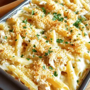 This Cheesy Garlic Parmesan Chicken Pasta Bake combines pasta, chicken, and creamy cheese sauce. It’s an easy dish that brings comfort and flavor to your table. You can follow the Full Recipe to make it step by step.
