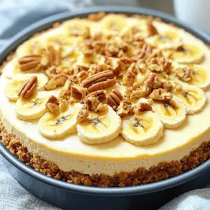 - 1 ½ cups vanilla wafer crumbs - ½ cup unsalted butter, melted - 2 tablespoons granulated sugar