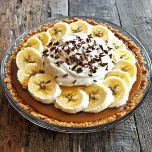 To make Easy Banoffee Pie, you need a few key ingredients: - 200g digestive biscuits, crushed - 100g unsalted butter, melted - 1 can (397g) sweetened condensed milk - 2 ripe bananas, sliced - 250ml heavy cream - 2 tablespoons powdered sugar - 1 teaspoon vanilla extract - Chocolate shavings or cocoa powder for garnish