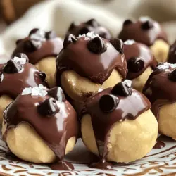 - 1 cup almond flour - 1/2 teaspoon baking soda - 1/4 teaspoon salt These main ingredients form the base of your cookie dough bites. Almond flour gives a nutty taste and soft texture. Baking soda helps the bites rise a bit, making them light. Salt enhances the flavors and balances the sweetness. - 1/4 cup maple syrup - 1/4 cup coconut oil, melted Maple syrup is a natural sweetener that adds rich flavor. It keeps your bites moist and chewy. Coconut oil provides healthy fats and a subtle coconut taste. Make sure it's melted for easy mixing. - 1 teaspoon vanilla extract - 1/2 cup chocolate chips (dark or semi-sweet) - 1/4 cup crushed pecans (optional) Vanilla extract brings warmth and depth to the flavor. Chocolate chips give that classic cookie taste. You can use dark or semi-sweet chips, depending on your taste. If you want more crunch, add crushed pecans. They add texture and nutty goodness. For the full recipe, you can check out the complete details to make these delightful bites. First, we need to mix the dry ingredients. In a medium bowl, combine: - 1 cup almond flour - 1/2 teaspoon baking soda - 1/4 teaspoon salt Mix these until they are fully blended. Next, we combine the wet ingredients. Add to the dry mix: - 1/4 cup maple syrup - 1/4 cup coconut oil, melted - 1 teaspoon vanilla extract Stir this mixture until a soft dough forms. This step is key for flavor. Now it’s time to form the bites. Scoop out tablespoon-sized portions of the dough. Roll each portion into a ball between your hands. Place these on a parchment-lined baking sheet. Make sure they have space between them. This allows them to chill well. After rolling the bites, refrigerate them for at least 30 minutes. This helps them firm up nicely. If you want to add a fun twist, melt some chocolate. Dip half of each bite into the chocolate, then let them set back on the parchment paper. Chill for another 15 minutes after dipping. For a special touch, serve them on a nice plate. You can drizzle more chocolate or sprinkle sea salt on top. For the full recipe, check out the detailed instructions! To get the perfect texture in your cookie dough bites, start with almond flour. This flour gives a nice, soft feel. If your dough seems too thick, add a bit more almond flour. This helps it stay moist but not too sticky. For sweetness, balance is key. If you find the dough too sweet, reduce the maple syrup slightly. This makes each bite just right. When you serve these cookie dough bites, presentation matters. Arrange them on a pretty plate. You can drizzle melted chocolate on top for flair. A sprinkle of sea salt adds a nice touch, too. For drinks, pair them with warm coffee or cold milk. This combo makes the bites even more enjoyable. You can save time by making these bites ahead. Just roll them into balls and freeze. They stay fresh for up to a month in the freezer. When you want some, let them sit out for a few minutes before eating. You can also try a no-bake version. This way, you skip the chilling step entirely. Just mix, roll, and enjoy right away! Check out the Full Recipe for more details. {{image_2}} You can make vegan chocolate chip cookie dough bites easily. Replace the maple syrup with agave nectar. Use a plant-based butter instead of coconut oil. This way, everyone can enjoy them! For gluten-free bites, stick to almond flour as your base. It gives a great taste and texture. You can also add gluten-free chocolate chips for extra flavor. Want to mix things up? Try adding different extracts. Almond extract gives a nutty taste. Peppermint extract adds a fresh twist. Both can enhance the flavor of your bites. You can also include other mix-ins like nuts or dried fruit. Chopped walnuts or cranberries add great texture and taste. Get creative with what you like! When it comes to chocolate, you have choices. Milk chocolate chips are sweeter and creamy. Dark chocolate chips add a rich, bold flavor. For a fun twist, consider using white chocolate chips. Each type brings its unique taste to your cookie dough bites. Try mixing different chocolates together for a delicious treat! You can follow the Full Recipe to create these tasty variations and find your favorite! Store your Chocolate Chip Cookie Dough Bites in an airtight container. Keeping them in the fridge works best. They stay fresh for up to one week. This way, you can enjoy a tasty bite whenever you want. If you want to keep them longer, freezing is a great option. Place the bites on a baking sheet first. Freeze them for about an hour. Once solid, transfer them to a freezer-safe bag. They can last up to three months in the freezer. To thaw, just leave them in the fridge for a few hours or overnight. If the bites feel a bit firm after refrigeration, you can revive their texture. Let them sit at room temperature for about 10 minutes. This makes them softer and easier to eat. If you prefer, you can re-dip them in melted chocolate for a fresh look and taste. This adds a fun twist every time you serve them. To make Chocolate Chip Cookie Dough Bites, you start by mixing dry and wet ingredients. First, in a medium bowl, combine almond flour, baking soda, and salt. Mix these well until combined. Next, add maple syrup, melted coconut oil, and vanilla extract. Stir until you form a dough. Then, fold in chocolate chips and optional crushed pecans. Scoop tablespoon-sized portions and roll them into balls. Place them on a lined baking sheet. Chill them for at least 30 minutes to firm up. If you like, dip half in melted chocolate for a special touch. You can find the full recipe above. Yes, these bites are naturally gluten-free because they use almond flour. You can easily swap almond flour with other gluten-free options, like oat flour or a gluten-free blend. Make sure to check that these substitutes are safe for your needs. This way, you can enjoy delicious bites without worry. Chocolate Chip Cookie Dough Bites can last up to a week when stored properly. Place them in an airtight container in the fridge. This keeps them fresh and tasty. If you want to enjoy them longer, you can freeze them. Just make sure to thaw them before serving. This way, you always have a treat ready to go! In this post, we explored making delicious Chocolate Chip Cookie Dough Bites. We covered ingredients like almond flour, maple syrup, and coconut oil. You learned step-by-step instructions, tips for perfection, and variations for every diet. Remember, you can store these bites easily and enjoy them fresh or frozen. With these details, you can create delightful treats that suit your taste. Enjoy your baking and feel free to experiment with flavors!