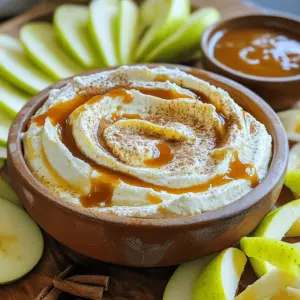 - 8 oz cream cheese, softened - 1 cup powdered sugar - 1 cup caramel sauce - 1 tsp vanilla extract - 1/2 tsp cinnamon The main ingredients create a creamy base. The cream cheese gives the dip its rich texture. Powdered sugar adds sweetness without graininess. The caramel sauce brings that classic flavor we love. Vanilla extract enhances the taste, while cinnamon offers a warm touch. - 1/2 cup chopped pecans or walnuts - Sliced apples for dipping Adding chopped nuts gives a nice crunch. They also boost the flavor profile. Sliced apples are perfect for dipping. They provide a fresh taste to balance the sweetness. - Granny Smith - Honeycrisp - Fuji Granny Smith apples are tart and crisp. They pair well with the sweet dip. Honeycrisp apples offer a juicy, sweet bite. Fuji apples are sweet and crunchy, making them great too. Choose any of these apples for the best experience. For the full recipe, check the section above. - Soften the cream cheese - Gather all ingredients To start, take your cream cheese out of the fridge. Let it sit at room temperature for about 30 minutes. This makes it easier to mix. While you wait, gather your ingredients. You will need: - 8 oz cream cheese, softened - 1 cup powdered sugar - 1 cup caramel sauce - 1 tsp vanilla extract - 1/2 teaspoon cinnamon - 1/2 cup chopped pecans or walnuts (optional) - Sliced apples for dipping - Beat cream cheese until smooth - Gradually incorporate powdered sugar Next, grab a medium mixing bowl. Use an electric mixer to beat the softened cream cheese. Mix it until it is smooth and creamy. This step is crucial for a nice texture. Slowly add in the powdered sugar. Keep mixing until it is fully combined. The mixture should be light and fluffy. - Add caramel sauce, vanilla, and cinnamon - Mix until creamy and smooth Now, it’s time for the fun part! Pour in the caramel sauce, vanilla extract, and cinnamon. Mix everything until it is creamy and smooth. If you want some crunch, fold in the chopped pecans or walnuts. This adds great texture. Finally, transfer your dip to a serving bowl. Drizzle some extra caramel sauce on top for a nice finish. Serve this dip with sliced apples for a delightful treat. For the full recipe, check out the details! Garnish your dip with extra caramel sauce. This adds sweetness and makes it look fancy. You can also use a variety of apple slices. Try Granny Smith, Honeycrisp, or Fuji apples. Different colors make the plate pop. If your dip is too runny, add more cream cheese. This will help it thicken up nicely. You can also use powdered sugar to adjust the thickness. If it is too thick, add a splash of milk. This will thin it out and make it smooth again. You can store the dip in the fridge. It will stay fresh for up to three days. Just cover it tightly with plastic wrap or a lid. To prepare in advance, mix all ingredients and store them. Then, add the apples and caramel when you’re ready to serve. For the full recipe, check out the earlier section. {{image_2}} You can spice up your caramel apple dip in fun ways. One great idea is adding chocolate chips. They bring a sweet, rich flavor that pairs well with the creamy dip. Just fold in about half a cup of mini chocolate chips after mixing the dip. Another tasty option is incorporating peanut butter. This gives a nutty twist to your dip. Use about a quarter cup of creamy peanut butter. Mix it in with the cream cheese for a smooth texture. This change makes the dip even more delicious and satisfying. You can also change how you serve the dip. Instead of just using it for apples, try it as a spread. It tastes great on toast or pancakes. Spread a generous layer on your favorite bread and enjoy a new snack. You can serve the dip with different fruits or snacks. Sliced pears, strawberries, or even pretzels work well. This adds variety and makes it fun for gatherings. Guests will love trying different combinations. If you're looking for healthier options, consider using low-fat cream cheese. It cuts calories without losing that creamy texture. You can find it at most grocery stores. Another option is sugar-free caramel sauce. This helps lower sugar content while keeping the dip sweet. Many brands offer tasty sugar-free alternatives. They work just as well in your recipe. Enjoy your caramel apple dip while keeping it light! For the full recipe, check out the Caramel Apple Delight Dip section. To keep your caramel apple dip fresh, use an airtight container. Glass or plastic containers work well. Make sure to seal it tightly after each use. This helps prevent air from getting in and keeps the dip creamy. You can store the dip in the fridge for easy access. You can warm up the caramel apple dip if you prefer it warm. To do this, use a microwave-safe bowl. Heat it in short bursts, about 10-15 seconds at a time. Stir in between to keep the texture smooth. Be careful not to overheat, as it can become too runny. This dip lasts up to five days in the fridge. Always check for signs of spoilage. If you see changes in smell or texture, it's best to throw it away. Keep your dip safe and tasty for all your gatherings! You can make quick caramel at home with just sugar and water. Heat 1 cup of sugar and 1/4 cup of water in a pot over medium heat. Stir until the sugar dissolves, then stop stirring. Let it simmer until it turns golden brown. Remove it from heat and slowly add 1/2 cup of heavy cream. Be careful, as it will bubble up. Stir until smooth and let it cool before using. Yes, you can use non-dairy cream cheese in this recipe. Brands like Tofutti or Kite Hill work well. Just make sure to check the texture. If it seems too thick, you might need to add a bit of milk or a plant-based milk alternative. This will help keep the dip creamy. You can serve many fruits and treats with caramel apple dip. Try these options: - Sliced pears - Bananas - Strawberries - Pretzels - Graham crackers These add fun textures and tastes to your dip experience. This blog post covered how to make a tasty caramel apple dip. We talked about the main and optional ingredients, like cream cheese and chopped nuts. You learned the step-by-step process for mixing it all together. Tips for serving and storing were shared to keep your dip fresh. Finally, we explored fun variations and answered common questions. Enjoy making this dip and experimenting with flavors. It’s simple, fun, and perfect for gatherings!