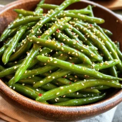 - 1 pound fresh green beans, trimmed - 3 tablespoons honey - 3 tablespoons soy sauce (or tamari for gluten-free) - 1 tablespoon sesame oil - 1 tablespoon olive oil - 2 garlic cloves, minced - 1 teaspoon sesame seeds (for garnish) - Salt and pepper to taste - 1/2 teaspoon red pepper flakes (optional, for a bit of heat) Gathering the right ingredients is key to making honey garlic green beans. Start with fresh green beans. You want them bright and crisp. Trim off the ends for a neat look and easier eating. Next, get your sauces and oils. Honey adds sweetness. Soy sauce gives it salt and umami flavor. If you need it gluten-free, choose tamari. Sesame oil adds a nice nutty taste, while olive oil helps with cooking. The garlic brings a punch of flavor. Mince it well to release its oils. For a finishing touch, you’ll need sesame seeds to sprinkle on top. Salt and pepper are important, too. They help balance the flavors. If you enjoy a little kick, add red pepper flakes. With these ingredients, you set the stage for a tasty side dish. Now, let’s move on to how to bring them together! 1. Blanch the green beans: Bring a large pot of water to a boil. Add the trimmed green beans. Cook them for 3-4 minutes. They should turn bright green and get slightly tender. 2. Shock in an ice bath: Quickly move the green beans to a bowl of ice water. This stops the cooking. Let them sit for a few minutes. Then, drain and set aside. 1. Whisk the ingredients: In a small bowl, combine 3 tablespoons of honey, 3 tablespoons of soy sauce, and 2 minced garlic cloves. 2. Add the oils: Mix in 1 tablespoon of sesame oil. If you like heat, include 1/2 teaspoon of red pepper flakes. Whisk until well blended. 1. Sauté the green beans: Heat 1 tablespoon of olive oil in a large skillet over medium heat. Add the blanched green beans. Sauté for 3-5 minutes. Stir occasionally until they start to brown. 2. Add the sauce: Pour the honey garlic sauce over the green beans. Toss them well to coat. Cook for another 2-3 minutes. Stir frequently until the sauce thickens. Enjoy your vibrant honey garlic green beans as a side dish! To get that perfect crunch in green beans, start by blanching them. This means boiling them in water for about 3-4 minutes. You want them bright green and just tender. After that, you must shock them in ice water. This step is key! It stops the cooking and keeps the beans crisp. - Blanching: Boil green beans for 3-4 minutes. - Shocking: Place them in ice water right after boiling. The ice bath helps maintain that vibrant color and snap. If you skip this, your beans may turn mushy and lose their taste. You can boost the flavor of your honey garlic green beans with extra spices. Try adding a pinch of ginger or some chopped scallions. These will add depth and warmth to the dish. - Extra spices: Ginger, scallions, or even a splash of rice vinegar. - Pairing options: These green beans go well with grilled chicken or salmon. They also complement rice and noodle dishes. Feel free to get creative! The beauty of this recipe is its versatility. You can mix and match flavors to suit your taste. Enjoy exploring the many ways to enhance these simple yet delicious green beans! {{image_2}} If you want to make honey garlic green beans fit your diet, you have options. For those who need gluten-free meals, swap soy sauce for tamari. Tamari gives you the same savory taste without gluten. It’s an easy fix that keeps this dish delicious. For vegan eaters, honey can be swapped out for maple syrup or agave nectar. These sweeteners add a nice touch while keeping it plant-based. You still get that sweet, yummy flavor without using honey. Feel free to get creative with your ingredients! Instead of green beans, try using snap peas or asparagus. They both work well with the honey garlic sauce. Different veggies can change the taste and keep it fresh. You can also play with sauces! Instead of soy sauce, use teriyaki or hoisin for a twist. Each sauce brings its own flair, adding new layers to the dish. You can even try different sweeteners like coconut sugar or brown sugar for a unique flavor. The possibilities are endless, so have fun experimenting! To keep your honey garlic green beans fresh, store them in an airtight container. Place the beans in the fridge within two hours of cooking. They will stay good for up to three days. Before eating, check for any signs of spoilage, like an off smell or slimy texture. If they seem fine, just reheat them. If you want to freeze your green beans, let them cool completely first. Use freezer-safe bags or containers. Remove as much air as you can before sealing. These beans can last for up to three months in the freezer. When you're ready to eat them, thaw them overnight in the fridge for the best results. To reheat your honey garlic green beans, use a skillet over medium heat. Add a splash of water or oil to help steam them. Stir gently for about five minutes until they are warm. You can also heat them in the microwave. Use a microwave-safe dish and cover it with a lid or wrap. Heat in short bursts, stirring in between, until they are hot. This keeps the flavor and texture just right. Yes, you can prepare honey garlic green beans ahead of time. To do this, follow these steps: - Blanch and cool the green beans as directed in the recipe. - Prepare the sauce and store it in a separate container. - Keep both the green beans and sauce in the fridge for up to three days. - When ready to serve, heat the green beans in a skillet and add the sauce. This method helps keep the flavors fresh and bright. Honey garlic green beans pair well with many dishes. Here are some ideas: - Grilled chicken or tofu for a protein boost. - Rice or quinoa to add a hearty base. - Stir-fried vegetables for extra color and nutrients. - Noodles tossed with sesame oil for a tasty twist. These options create a balanced meal that everyone will enjoy. To keep green beans crisp, follow these tips: - Blanch them for just 3-4 minutes. Overcooking makes them soft. - Shock them in ice water right after blanching. This stops cooking quickly. - Store them in an airtight container in the fridge if prepping ahead. - When cooking, sauté them quickly over medium heat. This helps them stay crunchy. These steps ensure your green beans remain bright and firm. In this post, we explored how to make delicious honey garlic green beans. You learned about fresh ingredients, sauces, seasonings, and step-by-step cooking tips. We also covered ways to store leftovers and suggested variations for different diets. These green beans are both easy to make and full of flavor. They can be a great side dish or shine on their own. Try mixing in your favorite spices and make this dish your own! Enjoy your cooking!