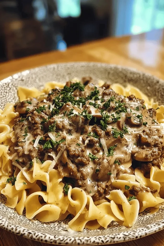 Discover the ultimate comfort food with this delicious ground beef stroganoff recipe! Perfectly seasoned ground beef, creamy sauce, and tender noodles come together in this easy-to-follow dish that will impress your family and friends. Ideal for busy weeknights or special occasions, this recipe delivers rich flavors and a hearty meal that everyone will love. Pin this for your next dinner inspiration and enjoy a cozy, satisfying experience!