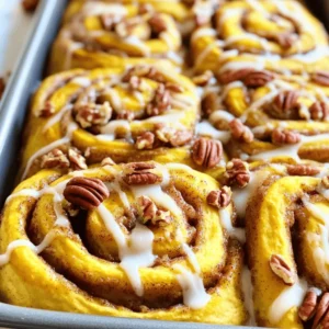 To make a tasty pumpkin spice cinnamon roll bake, gather these key items: - 2 cans of refrigerated cinnamon roll dough - 1 cup canned pumpkin puree - ½ cup cream cheese, softened - ½ cup brown sugar - 2 teaspoons pumpkin pie spice - 1 teaspoon vanilla extract - ½ teaspoon salt - ½ cup powdered sugar (for icing) - 2 tablespoons milk (for icing) These ingredients work together to create a rich and fluffy treat. The pumpkin puree adds flavor and moisture. The cinnamon roll dough gives it that fluffy base, while cream cheese and brown sugar make it sweet and creamy. You can customize your bake with these optional ingredients: - ¼ cup chopped pecans or walnuts Adding nuts gives a nice crunch. They also enhance the flavor, making each bite more exciting. Feel free to skip the nuts if you prefer a softer texture. Each serving of this delightful bake has about: - Calories: 320 - Total Fat: 15g - Saturated Fat: 5g - Carbohydrates: 45g - Sugar: 16g - Protein: 4g This treat is rich and filling. Enjoy it as a dessert or a sweet breakfast. Just remember to balance it with healthier options throughout the day. Start by gathering your ingredients. You will need: - 2 cans of refrigerated cinnamon roll dough - 1 cup canned pumpkin puree - ½ cup cream cheese, softened - ½ cup brown sugar - 2 teaspoons pumpkin pie spice - 1 teaspoon vanilla extract - ½ teaspoon salt - ¼ cup chopped pecans or walnuts (optional) - ½ cup powdered sugar (for icing) - 2 tablespoons milk (for icing) Preheat your oven to 350°F (175°C). Grease a 9x13 inch baking dish. In a mixing bowl, combine the pumpkin puree, cream cheese, brown sugar, pumpkin pie spice, vanilla, and salt. Mix until everything is smooth. Open the cinnamon roll cans and separate the rolls. Cut each roll into quarters. In the greased dish, add half of the cut rolls. Spoon half of the pumpkin mixture over them. If you want, sprinkle half of the chopped nuts on top. Next, layer the rest of the cinnamon roll pieces on top. Spoon the remaining pumpkin mix over this layer. Finish by adding the remaining nuts if you are using them. Bake the dish in your preheated oven for 25-30 minutes. The top should be golden brown, and the center needs to be set. After baking, let it cool for about 10 minutes. While it cools, prepare the icing. In a small bowl, whisk together the powdered sugar and milk until smooth. Drizzle this icing over the warm bake just before serving. Enjoy your sweet treat! To get the best pumpkin spice taste, use fresh pumpkin pie spice. This spice mix adds warmth and depth. Be sure to blend the pumpkin puree and cream cheese well. This ensures a smooth filling. You can also add extra cinnamon for more flavor. Just a pinch can make a big difference! Watch out for overbaking. Check for a golden top, but don't let it burn. Too much cream cheese can make the filling too thick. Stick to the recipe to keep it light. Also, don’t skip the icing! It adds sweetness and makes each bite special. Serve the bake warm for the best taste. A scoop of vanilla ice cream pairs well with it. You can also top with whipped cream for a treat. For a special touch, sprinkle more nuts on top right before serving. Enjoy with coffee or hot cocoa for a cozy feel! {{image_2}} You can change the nuts in the bake. Try using chopped pecans, walnuts, or almonds. If you prefer no nuts, that works too. The taste remains rich and sweet without them. Nuts add a nice crunch, but it's your choice. The icing is simple but can change. You can use cream cheese icing for more flavor. Mix cream cheese with powdered sugar and milk for a tangy twist. Another option is maple syrup instead of icing. Just drizzle it over the bake for a sweet finish. You can make this dish dairy-free. Use almond milk and coconut cream cheese instead. For gluten-free options, look for gluten-free cinnamon rolls. Many brands offer them, and they taste great. Adjusting these ingredients keeps the recipe delicious for everyone. To store leftovers, first let the bake cool completely. Then, cut it into pieces. Place the pieces in an airtight container. You can keep it in the fridge for up to three days. Make sure to seal it well to keep it fresh. When you want to enjoy the leftovers, preheat your oven to 350°F (175°C). Place the pieces on a baking sheet. Heat for about 10-15 minutes until warm. You can also use the microwave. Just heat for 30-second bursts until warm. This keeps the rolls soft and tasty. If you want to freeze it, cut the bake into pieces first. Wrap each piece in plastic wrap. Then, place them in a freezer bag. This helps prevent freezer burn. You can freeze it for up to two months. To enjoy later, thaw in the fridge overnight and reheat as mentioned above. Yes, you can prepare this dish ahead. Mix the pumpkin filling and cut the dough. Layer them in the baking dish. Cover it tightly and store it in the fridge. Bake it fresh the next day. This saves time and gives you a warm treat! If you don’t have pumpkin puree, use butternut squash puree. You can also use sweet potato puree. These options work well and taste great. Just make sure they are smooth and not too watery. Your Pumpkin Spice Cinnamon Roll Bake can last for about three days in the fridge. Store it in an airtight container to keep it fresh. Reheat portions in the microwave for a quick snack! Absolutely! Homemade cinnamon roll dough adds a personal touch. Just make sure it’s well risen and soft. Follow the same steps for layering and baking. Your bake will taste even better! This blog post covered everything you need to make a perfect Pumpkin Spice Cinnamon Roll Bake. From the main and optional ingredients to detailed instructions, you see how easy it is. I shared tips to boost the flavors and avoid common mistakes. You can even explore fun variations and learn how to store leftovers. With these ideas, you can enjoy this dish anytime. Get ready to impress your friends and family with your baking skills!