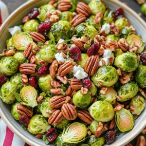 - 1 pound Brussels sprouts, trimmed and halved - ¼ cup olive oil - 3 tablespoons pure maple syrup - 2 tablespoons Dijon mustard - 1 tablespoon apple cider vinegar - ½ cup pecans, roughly chopped - ½ cup dried cranberries - Salt and pepper to taste - ¼ cup feta cheese, crumbled - Additional toppings When I make this Maple Dijon Brussels Sprouts Salad, I focus on the main ingredients first. Fresh Brussels sprouts are key. They give the salad a nice crunch and earthy taste. I trim and halve them for even cooking. Next, I choose high-quality olive oil. It helps the Brussels sprouts roast perfectly. The oil also adds a rich flavor. I use pure maple syrup for sweetness. It balances the peppery taste of the sprouts. I also add Dijon mustard and apple cider vinegar for zing. The mustard gives a nice kick. The vinegar adds brightness. Together, they make a great dressing. For texture, I toss in chopped pecans and dried cranberries. The nuts add a satisfying crunch. The cranberries bring sweetness and a pop of color. Feta cheese is optional but worth it. It adds creaminess and depth to the salad. You can skip it for a dairy-free option. Feel free to customize with your favorite toppings. You can try seeds or fresh herbs. This salad is all about freshness and flavor. First, trim the ends of the Brussels sprouts. This helps remove any tough parts. Then, cut each sprout in half. This allows them to cook evenly and absorb flavors. Next, place the halved Brussels sprouts in a bowl. Toss them with olive oil, salt, and pepper. Make sure they are well coated. This step adds flavor and helps with roasting. Next, preheat your oven to 400°F (200°C). This high heat will help the sprouts get crispy. Spread the Brussels sprouts on a baking sheet in a single layer. Roast them for 20 to 25 minutes. Stir them halfway through to ensure even cooking. Look for a golden brown color and tenderness. They should be crispy on the outside but soft on the inside. While the Brussels sprouts roast, it’s time to make the dressing. In a small bowl, combine maple syrup, Dijon mustard, and apple cider vinegar. Whisk these ingredients together until they are well mixed. Whisking is key, as it ensures the flavors blend nicely. The sweet and tangy dressing will enhance the salad’s taste. Once the Brussels sprouts have cooled slightly, it’s time to assemble the salad. In a large bowl, mix the roasted Brussels sprouts, chopped pecans, and dried cranberries. Drizzle the maple Dijon dressing over the top. Toss everything gently to combine. If you want, sprinkle crumbled feta cheese on top for extra flavor. This adds a delicious creaminess that pairs well with the dish. To get great Brussels sprouts, roast them at 400°F (200°C). This high heat helps them turn golden brown while making them tender. Roast them for about 20-25 minutes. Check them halfway through to stir. Look for a nice caramel color and a soft texture. If they smell sweet and nutty, they're ready! You can try different ingredients for your dressing. Instead of apple cider vinegar, use balsamic vinegar for a richer taste. For a spicy kick, add a pinch of chili flakes. You might also mix in a bit of honey if you want it sweeter. These choices can change the flavor profile and keep things exciting! For serving, a wide, shallow bowl works best. This presentation lets the colors pop. You can pair this salad with grilled chicken or fish for a balanced meal. It also goes well with roasted veggies or a warm grain, like quinoa. These sides add great nutrition and flavor to your plate! {{image_2}} You can make this salad even better with some fun add-ins. Try different nuts or seeds to add crunch. Pecans work great, but walnuts or sunflower seeds can also shine. Each nut brings a new flavor, so mix and match to find your favorite. Adding fresh herbs can brighten the taste. Chopped parsley or cilantro can add a fresh twist. Just a handful can make a big difference and enhance the overall flavor of the dish. Want to keep it vegan? Simply skip the feta cheese. The salad still tastes great without it. You can also substitute it with a vegan cheese or a sprinkle of nutritional yeast for that cheesy flavor. If you need gluten-free options, rest easy. This salad is naturally gluten-free. Just ensure any additional ingredients you use meet your dietary needs. Using seasonal fruits can really elevate your salad. In the fall, add diced apples or pears for natural sweetness. In the summer, try adding berries for a burst of color and flavor. You can also adapt flavors for special occasions. For a holiday touch, add pomegranate seeds for a festive look. These small changes keep the salad exciting all year round. Store leftover salad in an airtight container. Make sure to seal it well. It will stay fresh for about three days. If possible, keep the dressing separate. This keeps the Brussels sprouts crisp. For best results, use glass containers. They do not stain and are easy to clean. You can also see the contents easily. Plastic containers work, too, but may hold odors. Can it be frozen? I do not recommend freezing this salad. The Brussels sprouts can get mushy when thawed. The texture will not be pleasant. If you do freeze it, separate the dressing. Freeze the salad base without the dressing. For reheating, let it thaw overnight in the fridge. Then, heat in the oven at 350°F (175°C) until warm. This keeps the flavor and improves texture. You can use frozen Brussels sprouts, but the texture will change. Fresh Brussels sprouts are crisp and tender. Frozen ones can become softer when cooked. They also might have a more muted flavor. If you use frozen, try to thaw and drain them first. This helps keep your salad from getting watery. If you run out of maple syrup, don't worry. You can use honey or agave syrup as a sweetener. Both add a nice sweetness. Brown sugar mixed with water also works well. Adjust the amount to your taste. Start with less and add more if needed. Yes, this salad is great for meal prep! You can roast the Brussels sprouts in advance. Store them in the fridge for up to three days. Just keep the dressing separate until you're ready to eat. This keeps everything fresh and tasty. You can mix in the pecans and cranberries right before serving for the best crunch. This blog post covered how to make a delicious Brussels sprouts salad. We talked about key ingredients like Brussels sprouts, olive oil, and maple syrup. I explained how to prepare, roast, and dress the salad. You can also customize it with optional add-ins and variations. I hope you feel ready to try this recipe. Enjoy experimenting and make this salad your own! A fresh and flavorful dish awaits you.