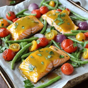 To make Honey Mustard Salmon Veggie Sheet Pan, you need fresh and tasty ingredients. Here’s what to gather: - 4 salmon fillets - 2 tablespoons Dijon mustard - 2 tablespoons honey - 1 tablespoon olive oil - 1 teaspoon garlic powder - 1 teaspoon smoked paprika - Salt and pepper to taste - 1 cup green beans, trimmed - 1 cup cherry tomatoes, halved - 1 bell pepper, sliced (any color) - 1 small red onion, cut into wedges - Fresh parsley, for garnish These ingredients work together to create a flavorful dish. The salmon provides healthy protein while the veggies add color and crunch. The honey mustard mix ties everything together with a sweet and tangy taste. Remember, fresh ingredients yield the best flavor! 1. Start by preheating your oven to 400°F (200°C). This heat will help cook the salmon and veggies perfectly. 2. Line a large baking sheet with parchment paper. This makes cleanup easy and keeps food from sticking. 3. In a small bowl, whisk together 2 tablespoons of Dijon mustard, 2 tablespoons of honey, and 1 tablespoon of olive oil. 4. Add 1 teaspoon of garlic powder, 1 teaspoon of smoked paprika, and salt and pepper to taste. Mix until smooth. 1. Place the 4 salmon fillets on one side of the baking sheet. 2. Brush each fillet with the honey mustard mixture. Make sure to coat them well for great flavor. 1. On the other side of the sheet pan, arrange 1 cup of trimmed green beans, 1 cup of halved cherry tomatoes, and slices of bell pepper. 2. Add the red onion wedges as well. 3. Drizzle the veggies with olive oil and season with salt and pepper. Toss them lightly to coat. 1. Place the baking sheet in the preheated oven. Bake for 15-20 minutes. 2. Check for doneness by seeing if the salmon flakes easily with a fork. The veggies should be tender and caramelized. 3. For a crisp finish, you can broil for the last 2-3 minutes. This adds a nice texture to the salmon and veggies. To get the best salmon, aim for an internal temp of 145°F (62.8°C). Use a fork to check if the fish flakes easily. This means it's done. Salmon should look moist but not raw. For perfect veggies, cut them into similar sizes. This helps them cook evenly. Green beans should be bright green and tender. Cherry tomatoes should burst with flavor. Bell peppers can be any color, but they add sweetness. Red onion gives a nice bite and color. You can switch salmon for other proteins. Chicken breast works great and cooks fast. Tofu is a good choice for a plant-based meal. For veggies, try zucchini or asparagus. They cook well and add flavor. To boost taste, add fresh herbs like dill or thyme. You can mix in a splash of lemon juice for brightness. Garlic and onion powder are great, but fresh garlic gives a stronger taste. Consider adding a pinch of cayenne for heat. A little goes a long way! If you like sweet, try maple syrup instead of honey. This adds depth and a unique twist. {{image_2}} You can change the taste of your Honey Mustard Salmon Veggie Sheet Pan. For an Asian twist, swap the Dijon for soy sauce. Add sesame oil and ginger for depth. For Mediterranean vibes, mix in olive tapenade and fresh herbs. Use lemon zest to brighten the dish. If you enjoy heat, add chili flakes or sriracha to the honey mustard mix. This spice will add a nice kick! If you want a different cooking style, try grilling. Preheat your grill and place the salmon on a grill pan. Cook it for about 5-7 minutes per side. This method gives the salmon a nice char and smoky flavor. You can also sauté the salmon and veggies in a skillet. Heat olive oil in the pan and cook everything on medium heat. This method allows you to keep a close eye on your food. You can adapt this recipe with seasonal produce. In spring, add asparagus or snap peas for freshness. Summer calls for zucchini and corn, which add sweetness. In fall, consider using Brussels sprouts and butternut squash. For winter, root vegetables like carrots and parsnips work well. This way, you enjoy the best flavors each season has to offer. After enjoying your Honey Mustard Salmon Veggie Sheet Pan, you may have leftovers. To store them safely in the fridge, first, let the dish cool down. Place the salmon and veggies in an airtight container. Make sure it is sealed well to keep out air. Store it in the fridge for up to three days. This helps maintain flavor and freshness. When you’re ready to eat the leftovers, reheating is easy. I recommend using an oven or toaster oven. Preheat it to 350°F (175°C). Place the salmon and veggies on a baking sheet. Cover them loosely with foil to keep moisture in. Heat for about 10-15 minutes until warm. This method keeps the salmon moist and the veggies crisp. If you want to freeze leftovers, it’s simple. First, let the dish cool completely. Then, wrap the salmon and veggies tightly in plastic wrap or foil. Place them in a freezer-safe bag or container. Label it with the date. You can freeze it for up to three months. To defrost, take it out of the freezer and place it in the fridge overnight. Reheat as mentioned above. Enjoy your tasty meal later! It takes about 15 to 20 minutes to cook honey mustard salmon. You will know it’s done when the salmon flakes easily with a fork. The veggies will also be tender and slightly caramelized. This quick cooking time makes this dish perfect for busy weeknights. Yes, you can use frozen salmon for this recipe. Just make sure to defrost it first. You can leave it in the fridge overnight or run it under cold water for a quicker thaw. The cooking time may vary slightly, so keep an eye on it. You can serve honey mustard salmon with many tasty side dishes. Here are a few ideas: - Quinoa or rice for a hearty base. - A fresh green salad for a light touch. - Roasted potatoes for added crunch. - Steamed broccoli for extra veggies. Yes, this recipe is great for meal prep. You can cook the salmon and veggies in advance. Just store them in airtight containers in the fridge. They will stay fresh for up to three days. Reheat gently to keep the salmon moist and the veggies crisp. This blog post provided a simple way to make honey mustard salmon with vegetables. We covered the key ingredients, preparation steps, and tips for success. You learned how to adjust flavors and methods to suit your taste. Remember, cooking is fun and creative. Don't be afraid to try new ingredients and techniques. With these tools, you can make a delicious meal that impresses anyone. Enjoy your cooking journey!