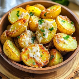 - 1.5 lbs baby potatoes, halved - 3 tablespoons olive oil - 4 cloves garlic, minced - 1 teaspoon dried oregano - 1 teaspoon smoked paprika - Salt and pepper to taste - ½ cup grated Parmesan cheese - 2 tablespoons fresh parsley, chopped (for garnish) These ingredients create a tasty and crispy dish. I love using baby potatoes for this recipe. They cook evenly and have a nice texture. Olive oil gives the potatoes a rich flavor. Next, minced garlic adds a strong aroma and taste. Dried oregano brings in a herby note that complements the garlic well. Smoked paprika adds a bit of warmth and depth. Salt and pepper enhance all the flavors. Grated Parmesan cheese makes everything extra cheesy and delicious. Finally, fresh parsley adds a pop of color and freshness as a garnish. Gather all these ingredients before you start cooking. It makes the process easier and more fun! Preheating your air fryer is key. Set it to 400°F (200°C) and let it warm up for about 5 minutes. This step helps the potatoes cook evenly. If you skip this, your potatoes may not get that nice, crispy texture we all love. Start by halving 1.5 pounds of baby potatoes. Place them in a large bowl. Add 3 tablespoons of olive oil, 4 minced garlic cloves, 1 teaspoon dried oregano, 1 teaspoon smoked paprika, and salt and pepper to taste. Mix everything well until the potatoes are coated. Now, sprinkle in ½ cup of grated Parmesan cheese. Toss again to make sure every piece is nicely covered in cheese. Place the seasoned potatoes in the air fryer basket. Spread them out in a single layer. This allows hot air to circulate, cooking them evenly. Air fry for 15 to 20 minutes. Shake the basket halfway through. This helps them cook on all sides. You want them golden brown and crispy on the outside. Once done, transfer them to a bowl and garnish with 2 tablespoons of chopped fresh parsley for a fresh touch. To get that perfect crunch, cook your potatoes for 15-20 minutes. Check them halfway through and shake the basket. This helps them cook evenly. If you like them extra crispy, add a few more minutes. You can also try different cooking times for softer or firmer potatoes. To boost the taste, consider adding other spices. Paprika gives a smoky flavor, while garlic powder adds depth. You can also try fresh herbs like rosemary or thyme. Fresh herbs have a bright flavor, while dried herbs offer a more subtle taste. Mix and match to find your favorite blend! For a beautiful presentation, use a rustic bowl or a wooden platter. Top with extra Parmesan cheese and parsley for color. Serve with a dipping sauce, like ranch or yogurt. This adds a creamy contrast to the crispy potatoes. Pair them with grilled chicken or a fresh salad for a complete meal. {{image_2}} You can switch up the potatoes for different flavors. Try red or yellow potatoes. These add a nice texture and taste. You can also mix in other seasonings. Rosemary or thyme works great for herbal notes. Feel free to experiment and find your favorite combo! Want to add some heat? You can easily make your potatoes spicy. Try adding chili flakes or a dash of hot sauce. This option gives a fun kick to every bite. Adjust the amount to match your spice level. Enjoy the extra zing! If you prefer a vegan dish, you can skip the cheese. Use a dairy-free cheese substitute for a similar taste. You can also use avocado oil instead of olive oil. This way, you keep the rich flavor without using any dairy. Enjoy the same great taste while sticking to your diet! To keep your Air Fryer Garlic Parmesan Potatoes fresh, follow these tips: - Cool them down: Let the potatoes cool to room temperature. - Use an airtight container: Store them in a container with a tight lid. - Refrigerate: Keep them in the fridge within two hours of cooking. - Freshness: Eat leftovers within 3 days for the best taste. You can reheat your potatoes in different ways. Here are some options: - Air Fryer: This method is best. Set it to 350°F (175°C) for about 5-7 minutes. - Oven: Preheat your oven to 375°F (190°C). Bake for 10-15 minutes. - Crispiness tips: Add a little olive oil before reheating to keep them crunchy. - Check often: Stir or shake the potatoes halfway through to heat evenly. Cooking Air Fryer Garlic Parmesan Potatoes takes about 30 minutes total. Here’s the breakdown: - Prep time: 10 minutes - Cooking time: 15-20 minutes Preheat your air fryer at 400°F (200°C) for about 5 minutes. Then, mix your ingredients and air fry. Yes, you can make these potatoes ahead of time. Here’s how to store and reheat them: - Storage: Let the potatoes cool. Place them in an airtight container. They stay fresh in the fridge for 3-4 days. - Reheating: Use the air fryer to maintain crispiness. Heat them at 350°F (175°C) for about 5-7 minutes. To get crispy potatoes, follow these tips: - Cut evenly: Halve the baby potatoes so they cook uniformly. - Toss well: Make sure to coat them evenly with olive oil and seasonings. - Single layer: Place potatoes in a single layer in the air fryer basket. This helps hot air circulate. - Shake halfway: Shake the basket halfway through cooking to ensure all sides get crispy. These steps will help you achieve the perfect crispy texture every time. Now you know how to make Air Fryer Garlic Parmesan Potatoes. We covered the ingredients, step-by-step instructions, and tips for perfect crispiness. Remember, preheating your air fryer is key to great results. You can try variations with different spices or potatoes to mix things up. Proper storage and reheating methods keep leftovers fresh. Enjoy impressing family and friends with this simple and tasty dish. Happy cooking!
