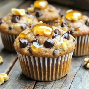 To make these banana bread protein muffins, you need simple and healthy ingredients. Here's the list: - 3 ripe bananas, mashed - 1 cup rolled oats - 1/2 cup protein powder (vanilla or unflavored) - 1/4 cup almond milk (or any milk of choice) - 1/4 cup honey or maple syrup - 2 large eggs - 1 teaspoon baking powder - 1/2 teaspoon baking soda - 1 teaspoon cinnamon - Pinch of salt - 1/2 cup walnuts or pecans, chopped (optional) - 1/2 cup dark chocolate chips (optional) Each ingredient plays an important role in the muffins. Ripe bananas add natural sweetness and moisture. Rolled oats provide a chewy texture and fiber. The protein powder boosts nutrition, making these muffins a great snack. Almond milk keeps the batter light and adds flavor. Sweeteners like honey or maple syrup enhance taste without refined sugar. Eggs help bind everything together and add protein. Baking powder and soda ensure the muffins rise. Cinnamon gives a warm flavor, while salt balances the sweetness. You can also add walnuts or pecans for a crunchy bite or dark chocolate chips for a sweet surprise. These options let you customize your muffins to suit your taste. Start by preheating your oven to 350°F (175°C). This heat is perfect for baking. Next, get your muffin tin ready. You can use paper liners for easy cleanup or spray the tin with cooking spray. This helps the muffins come out easily after baking. In a large mixing bowl, take three ripe bananas and mash them well. The riper they are, the sweeter your muffins will be. Add in one cup of almond milk, 1/4 cup of honey or maple syrup, and two large eggs. Mix everything together until it is smooth. You want to blend the flavors and make a nice batter base. In another bowl, combine one cup of rolled oats, 1/2 cup of protein powder, one teaspoon of baking powder, 1/2 teaspoon of baking soda, one teaspoon of cinnamon, and a pinch of salt. Stir these dry ingredients together. This step helps evenly distribute the baking powder and soda. Now, slowly add the dry mixture to the wet mixture. Stir gently until just combined. Be careful not to overmix; this keeps the muffins light. If you want to add texture, fold in 1/2 cup of chopped walnuts or pecans and 1/2 cup of dark chocolate chips if you like a sweeter touch. Take your batter and divide it evenly into the muffin tin. Fill each cup about 2/3 full. This gives the muffins room to rise without overflowing. Place the muffin tin in your preheated oven. Bake for about 15-20 minutes. To check if they are done, insert a toothpick in the center. If it comes out clean, they are ready. After baking, let the muffins cool in the tin for about 5 minutes. Then, transfer them to a wire rack to cool completely. To get the best muffin texture, focus on mixing. When you mix the wet and dry ingredients, do it gently. Overmixing will make them tough. You want the batter to be lumpy but combined. Also, make sure your bananas are very ripe. Ripe bananas add moisture and sweetness. This helps keep your muffins soft and fluffy. You can make swaps in this recipe to suit your taste. If you don’t have protein powder, you can use almond flour or coconut flour. For the milk, any milk will work, like oat milk or cow's milk. If you want a sweeter option, swap honey for agave syrup. For nuts, try pecans or sunflower seeds. You can also leave out the chocolate chips if you prefer a more classic muffin. To keep your muffins fresh, store them in an airtight container. They stay good for up to three days at room temperature. If you want them to last longer, freeze them. Wrap each muffin in plastic wrap, then place them in a freezer bag. They will keep well for up to three months. When you’re ready to eat, just thaw them at room temperature or heat them in the microwave. {{image_2}} You can swap the protein powder for different options. Try whey, pea, or soy protein. Each one changes the taste and texture a bit. You can even use Greek yogurt as a protein source. Just adjust the liquid in the recipe. This way, you can keep it fun and fit your needs. Adding different spices or extracts can make these muffins your own. For a warm kick, try adding nutmeg or ginger. You can even mix in some cocoa powder for a chocolate twist. Vanilla or almond extract can boost the flavor too. Just a teaspoon of either will change the game. If you want to lower sugar, use mashed dates or applesauce. These natural sweeteners pack flavor while cutting calories. You can also use stevia or monk fruit for a low-calorie option. Honey and maple syrup are great, but they add sugar. Choose what fits your diet best. Each muffin offers a great mix of nutrients. You get about 150 calories per muffin. They pack around 7 grams of protein. The carbs come in at about 22 grams. Each muffin has around 5 grams of fat. The mix of oats and bananas makes them filling and tasty. - Bananas: Rich in potassium, they help with heart health and digestion. - Rolled oats: Full of fiber, they keep you full and help with digestion. - Protein powder: Provides essential amino acids for muscle growth. - Almond milk: Low in calories and a good source of vitamin E. - Honey or maple syrup: Natural sweeteners that offer antioxidants. - Eggs: Packed with protein and healthy fats. - Walnuts or pecans: Offer omega-3 fatty acids for brain health. - Dark chocolate chips: They add flavor and antioxidants. To make these muffins a complete meal, try serving them with Greek yogurt. A dollop of yogurt adds protein and creaminess. You can also enjoy them with fresh fruit for added vitamins. Pairing muffins with a glass of milk gives extra calcium, too. These combinations make a great snack or breakfast choice. Yes, you can use frozen bananas. Just thaw them first. Frozen bananas work well. They add moisture and sweetness. Mash them up like fresh ones. Using them may actually make your muffins softer. Store your muffins in an airtight container. Keep them at room temperature for up to three days. For longer storage, place them in the fridge. You can also freeze them for up to three months. Just wrap each muffin tightly before freezing. Thaw them in the fridge or microwave when ready to eat. Yes, you can! Replace eggs with flax eggs. Mix one tablespoon of flaxseed meal with three tablespoons of water. Let it sit for five minutes until it thickens. Substitute almond milk with any plant-based milk. Use maple syrup instead of honey for sweetness. You can adjust the sweetness easily. Use less honey or maple syrup if you prefer less sugar. Add more if you like it sweeter. Consider using mashed dates or applesauce as alternatives. These options can add natural sweetness without extra sugar. Dense muffins may be due to overmixing the batter. Mix just until everything is combined. Too much mixing can stir in too much air. Another reason could be using too much flour. Always measure your ingredients carefully. Make sure to spoon flour into the measuring cup instead of scooping. You learned how to make banana bread protein muffins with simple ingredients. We covered prep, mixing, and baking steps. Remember, you can adjust flavors and ingredients to fit your taste. The right storage keeps them fresh longer. Each muffin packs nutrients and energy. Enjoy customizing them for your needs. With these tips, you’ll bake like a pro and impress everyone. Healthy eating can be enjoyable. Dive in and have fun with these muffins!