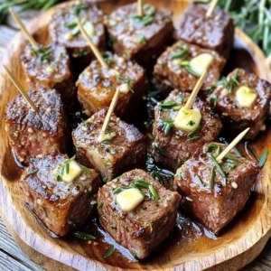 - 1 lb (450g) sirloin steak, cut into bite-sized cubes - 4 tablespoons unsalted butter - 4 cloves garlic, minced - 1 teaspoon fresh rosemary, chopped (or ½ teaspoon dried) - 1 teaspoon fresh thyme leaves (or ½ teaspoon dried) - Salt and pepper to taste - 1 tablespoon olive oil - Fresh parsley, chopped, for garnish I suggest using sirloin steak for this dish. Sirloin offers great flavor and tenderness. You can also try ribeye or tenderloin if you want something richer. Both cuts will add a nice depth to your garlic butter steak bites. You can add some heat with red pepper flakes or switch up the herbs. Try adding oregano or basil for a twist. To make it fancy, serve with a sprinkle of blue cheese. Fresh herbs like chives or dill can also add freshness. Using these options will enhance the dish's flavor and presentation. Start by cutting your sirloin steak into bite-sized cubes. Make sure they are even. Next, season the cubes with salt and pepper. This helps boost their flavor. Let them rest at room temperature for about 15 minutes. This step helps make the steak tender and juicy. Grab a large cast-iron skillet or a heavy pan. Heat the olive oil over medium-high heat. You want it to shimmer but not smoke. This means it's ready for the steak. Once the oil is hot, add the steak cubes in a single layer. Don't crowd the pan! Sear for about 2 minutes without moving them. This helps form a nice crust. After 2 minutes, flip the cubes. Sear for another 2 minutes. They should be medium-rare and brown. Remove the steak bites from the skillet and set them aside. In the same skillet, lower the heat to medium. Add the unsalted butter and let it melt. Once melted, add your minced garlic, chopped rosemary, and thyme. Stir this mix for about 1 to 2 minutes. The smell will be amazing, but watch the garlic so it doesn't burn. Now, it's time to bring everything together. Return the seared steak bites to the skillet. Toss them in the garlic butter mixture. Make sure they are well coated. Cook them together for one more minute. This step lets the flavors mix beautifully. Remove the skillet from the heat. Sprinkle freshly chopped parsley over the steak bites. This adds a nice pop of color. Serve the steak bites on a platter. You can use toothpicks for easy eating. Drizzle some garlic butter sauce from the skillet on top. For a full meal, pair them with roasted veggies or a fresh salad. Enjoy! To get steak bites just right, start with good meat. I suggest using sirloin steak. Cut it into bite-sized cubes. Season those cubes with salt and pepper. Let them sit for about 15 minutes at room temperature. This helps the flavors mix and the meat become tender. When cooking, use a hot skillet. This gives a good sear. Sear each side for two minutes. Aim for a nice brown crust but keep it medium-rare. This balance keeps the meat juicy. For best results, use a cast-iron skillet or a heavy pan. These hold heat well and create a great crust. A good spatula helps you flip the steak without tearing it. Using a meat thermometer can help you check doneness. Aim for 130°F for medium-rare. While garlic and butter shine, extra herbs can boost flavor. Try adding fresh parsley or oregano. These herbs add a nice touch. You can also sprinkle in some red pepper flakes for heat. Experimenting with spices leads to more fun. Consider a splash of Worcestershire sauce or a hint of lemon juice. These add depth and freshness to the dish. {{image_2}} If you want to mix things up, try different proteins. Chicken, shrimp, or even tofu work great in this dish. Just cut them into bite-sized pieces like the steak. Adjust cooking time as needed. Chicken will take a bit longer than steak, while shrimp cooks faster. You can easily change the flavor of your steak bites. For a spicy kick, add red pepper flakes or cayenne pepper to the garlic butter. If you prefer something sweet, drizzle a bit of honey in the butter. You can also add soy sauce for a savory twist. Experiment with flavors that excite you. These steak bites suit many occasions. For parties, serve them on a platter with toothpicks. This makes them easy to grab and enjoy. For a cozy dinner, pair them with roasted vegetables or a fresh salad. You can also serve them as a main dish for a special date night. The options are endless! To store leftover garlic butter steak bites, let them cool first. Place the steak bites in an airtight container. Add any leftover garlic butter on top. Seal the container tightly. You can keep them in the fridge for up to three days. When you're ready to eat, reheat the steak bites gently. You can use a skillet over low heat. Add a splash of water or broth to keep them moist. Stir often until heated through. This helps maintain their juicy texture. Avoid using high heat as it can dry them out. If you want to freeze the steak bites, do so right after cooking. Let them cool completely. Place them in a freezer-safe bag or container. Remove as much air as possible before sealing. They can last in the freezer for up to three months. To thaw, move them to the fridge overnight before reheating. To make steak bites tender, start with good meat. Use sirloin, which is flavorful and tender. Season the cubes with salt and pepper, and let them sit at room temp for 15 minutes. This step helps the meat cook evenly. Searing in a hot skillet for a short time keeps them juicy. Overcooking makes them tough, so aim for medium-rare. Yes, you can use other cuts. Ribeye or filet mignon work well too. They have great flavor and stay tender. Just remember, lean cuts like flank steak may be chewier. Adjust cooking time based on the cut. Always check for doneness to keep them juicy. Garlic butter steak bites pair well with several sides. I love serving them with roasted vegetables or a fresh salad. You can also add mashed potatoes or rice for a heartier meal. For a fun twist, serve with toothpicks for easy snacking at parties! Garlic butter steak bites can last about 3 to 4 days in the fridge. Store them in an airtight container to keep them fresh. Reheat gently in a skillet to avoid drying them out. Enjoy them as a quick meal or snack! We covered how to make delicious garlic butter steak bites with simple steps. Remember the right ingredients, quality cuts, and cooking tips for the best taste. Enjoy your meal by exploring different flavors and side dishes. Store leftovers properly for next time. Cooking can be fun and easy, so try it out! Enjoy every bite and impress others with your skills. You can master this dish and make it your own.