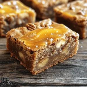 - 1 cup unsalted butter, melted - 1 cup brown sugar, packed - ½ cup granulated sugar - ½ cup apple cider - 2 large eggs - 1 teaspoon vanilla extract - 2 cups all-purpose flour - 1 teaspoon baking powder - ½ teaspoon baking soda - ½ teaspoon salt - 1 teaspoon ground cinnamon - ½ cup chopped walnuts or pecans (optional) - 1 cup caramel sauce (store-bought or homemade) I love using fresh apple cider in these blondies. It adds a rich flavor that fits fall perfectly. The butter gives a nice moistness, while the brown sugar brings a deep, caramel-like taste. Granulated sugar gives sweetness without being too heavy. You can add eggs for structure and texture. Vanilla extract enhances the overall taste. Flour gives the blondies their body. Baking powder and baking soda help them rise, making them soft. Salt balances the sweetness. Ground cinnamon adds warmth and spice. If you like nuts, walnuts or pecans add a nice crunch. You can skip them if you prefer a smooth texture. Lastly, caramel sauce is key. It makes these blondies extra special. You can use store-bought or homemade. - For a dairy-free option, use coconut oil instead of butter. - Applesauce can replace eggs for a vegan choice. - For gluten-free blondies, try almond flour or a gluten-free blend. These swaps help you enjoy the flavor while meeting dietary needs. - Preheat your oven to 350°F (175°C). - Grease and line a 9x13 inch baking pan with parchment paper. Leave some paper hanging over the sides. This helps you lift out the blondies later. - In a large bowl, combine the melted butter, brown sugar, and granulated sugar. Whisk until smooth. - Next, stir in the apple cider, eggs, and vanilla extract. Mix until everything is well blended. - In another bowl, whisk together the all-purpose flour, baking powder, baking soda, salt, and ground cinnamon. This step is key to even mixing. - Gradually add the dry ingredients to the wet mixture. Mix gently until just combined. If you like, fold in chopped nuts at this point. - Pour the batter into the prepared baking pan. Use a spatula to spread it evenly. - Drizzle caramel sauce over the top. Reserve a bit of sauce for serving. Use a knife or toothpick to swirl the caramel into the batter. - Bake in your preheated oven for 25-30 minutes. Check for doneness by inserting a toothpick in the center. It should come out with a few moist crumbs, not wet batter. To get the best blondies, do not overmix the batter. Mix just until you see no dry flour. Overmixing makes them tough. Once baked, let them cool completely before slicing. This step helps them set well and makes cutting easier. You can make homemade caramel sauce easily. Just heat sugar and water until it melts and turns golden. Stir in butter and cream for a rich taste. If you prefer store-bought, look for a high-quality brand. Choose one that has a rich flavor and smooth texture. Serve the blondies warm or at room temperature. Drizzle extra caramel sauce on top for added sweetness. A sprinkle of sea salt enhances the flavors and adds a nice touch. You can also add whipped cream or ice cream for a special treat. {{image_2}} You can spice up your blondies easily. Adding spices like nutmeg or cloves gives them warmth. A pinch of nutmeg adds a cozy taste. Cloves bring a bold flavor that pairs well with apple cider. You can also add fruits to the mix. Diced apples will boost the apple flavor. They create a nice texture, too. Dried cranberries add a sweet-tart twist. Both options make your blondies even more delightful. Nuts also change the game for these blondies. You can use almonds or pecans for a crunchy bite. They add flavor and good fats. If you want them nut-free, just leave them out. The blondies will still taste great without nuts. If you choose to add nuts, chop them finely. This way, they blend in well with the batter. You’ll get a nice surprise in every bite. Chocolate lovers, rejoice! You can add chocolate chips or chunks to your blondies. They melt into gooey pockets of goodness. Swirling chocolate into the batter adds a fun twist, too. Just pour some melted chocolate over the top. Use a knife to create swirls. This method makes your blondies look fancy and taste amazing. Each bite will be a sweet adventure! To keep your Apple Cider Caramel Blondies fresh, store them in an airtight container. This helps retain their moisture and flavor. If you need to refrigerate them, place a piece of parchment paper between layers to avoid sticking. This method works wonders for maintaining the perfect texture. Freezing is another great option. Cut the blondies into squares before freezing. Wrap each square tightly in plastic wrap, then place them in a freezer-safe bag. This way, you can grab one whenever you crave a sweet treat. Just let them thaw at room temperature for about 30 minutes before enjoying. When stored at room temperature, these blondies last about 3 to 4 days. Keep them in a cool, dry place, away from direct sunlight. After a few days, you might notice changes in texture or taste. Watch for signs of spoilage. If the blondies become dry or hard, they may not be enjoyable anymore. If you see any mold or strange smells, it’s best to throw them out. Always trust your senses. If something seems off, it’s safer to discard the food. Yes, you can make these blondies a day ahead. Allow the blondies to cool completely. Then, wrap them tightly in plastic wrap. This keeps them fresh. You can store them in the fridge. Just take them out an hour before serving for the best taste. I love pairing these blondies with vanilla ice cream. The cold ice cream balances the warm blondies. You can also serve them with spiced apple cider. A dollop of whipped cream adds a nice touch too. For a drink, try a warm chai tea or cider. Look for a golden brown top. The edges should pull away from the pan slightly. When you insert a toothpick, it should come out with a few moist crumbs. This means the blondies are ready. Don't overbake them; they can turn dry quickly! In this post, I shared a detailed recipe for Apple Cider Caramel Blondies. We covered the ingredients, step-by-step instructions, and tips for the best results. I also suggested variations and storage advice to keep your blondies fresh. These sweet, chewy treats can be adapted for your tastes. Experiment with flavors and toppings. Enjoy sharing them with family and friends. Happy baking!
