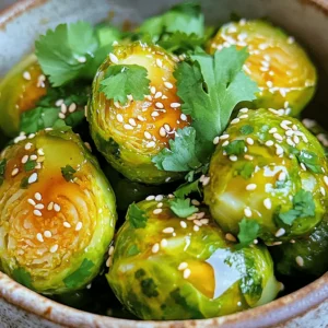 - 1 lb Brussels sprouts, trimmed and halved - 2 tablespoons olive oil - 1 tablespoon honey - 1 tablespoon sriracha sauce (adjust to taste) - 1 teaspoon garlic powder - 1 teaspoon smoked paprika - Salt and pepper to taste - 2 tablespoons sesame seeds (optional, for garnish) - Chopped fresh cilantro (optional, for garnish) - If you want a different sweetener, use maple syrup or agave nectar instead of honey. - For heat, try different hot sauces like chili garlic sauce or even red pepper flakes. - You can swap olive oil with avocado oil or grapeseed oil for a different flavor. These options keep the dish tasty and fun. Don't hesitate to mix things up! Set your air fryer to 375°F (190°C). Preheat it for about 5 minutes. Preheating helps the sprouts cook evenly. It ensures a nice crisp outside while keeping the inside tender. Start by trimming the ends of the Brussels sprouts. Then, cut each sprout in half. Use fresh, firm sprouts for the best taste. Rinse them well under cold water to remove dirt. Pat them dry with a paper towel before cooking. In a small bowl, mix olive oil, honey, sriracha, garlic powder, and smoked paprika. Stir well until combined. Taste the sauce and adjust the sriracha if you want more heat. The balance of sweet and spicy makes this dish special. Place the Brussels sprouts in the air fryer basket. Make sure they are in a single layer for even cooking. Cook them for about 15-18 minutes. Remember to shake the basket halfway through. Check for doneness by looking for a crispy outside and tender inside. If you want more crispiness, add a couple more minutes. To get that perfect crunch, cook your Brussels sprouts for 15 to 18 minutes at 375°F. If you want them crispier, add a few extra minutes. Remember to shake the basket halfway through cooking. This helps them cook evenly and prevents sogginess. Also, make sure to space them out in the basket. Overcrowding can trap steam and make them soft. You can boost the flavor by adding spices like cumin or chili powder. Fresh herbs like thyme or rosemary also work well. If you want it spicier, add more sriracha or even some red pepper flakes. For a milder taste, cut back on the hot sauce and add more honey. These Brussels sprouts pair great with roasted chicken or grilled fish. You can also serve them on a bed of rice or quinoa for a filling meal. Get creative! Try topping them on a salad or serving them as a tasty appetizer. The options are endless! {{image_2}} You can easily make this dish vegetarian or vegan. Simply replace honey with maple syrup or agave nectar. Both options add a sweet touch without using animal products. For the sauce, ensure your hot sauce is vegan-friendly. Most sriracha brands are, but always check the label. Enjoy the same great taste and keep it plant-based! Want to explore new flavors? Try an Asian twist! Add soy sauce and ginger to the mix. This gives a savory kick to the Brussels sprouts. For a Mediterranean flair, use olive oil, lemon juice, and oregano. These changes make the dish fresh and zesty. Get creative and mix flavors that excite your taste buds! You can enhance your Brussels sprouts with seasonal add-ins. Nuts like almonds or walnuts add crunch and richness. Dried fruits like cranberries or apricots offer a sweet contrast. For extra color and nutrition, add seasonal veggies like carrots or bell peppers. These additions make your dish even more enjoyable and unique! To store your sweet and spicy Brussels sprouts, let them cool first. Place them in an airtight container. This helps keep them fresh and tasty. You can refrigerate them for up to three days. If you want to keep them longer, consider freezing. Use a freezer-safe bag or container. Make sure to remove as much air as possible to prevent freezer burn. When reheating, I recommend the air fryer for the best results. Set it to 350°F (175°C) and heat for about 5-7 minutes. This keeps the Brussels sprouts crispy. Avoid the microwave if you can. It can make them soggy. You can also toss them in a pan over medium heat for a quick reheat. For serving leftovers, try adding them to a salad or mixing them into a grain bowl. They also pair well with eggs for a tasty breakfast! Yes, you can use frozen Brussels sprouts. Just remember to thaw them first for best results. Frozen sprouts may take a bit longer to cook in the air fryer. Always check for doneness by poking them with a fork. To reduce bitterness, you can soak them in cold water for about 30 minutes. Adding sweet ingredients, like honey in this recipe, also helps balance the flavor. Roasting or air frying can enhance their natural sweetness too. These sprouts pair well with grilled chicken, fish, or tofu. You can also serve them as a side for a hearty grain bowl. Try them with quinoa, rice, or even a fresh salad for a complete meal. Yes, you can prep Brussels sprouts in advance. Trim and halve them, then store in an airtight container in the fridge. You can mix the sauce ahead too. Just combine everything when you are ready to cook. The best air fryer temperature for vegetables is around 375°F (190°C). This temperature cooks them evenly while keeping them crispy. Always check halfway through and shake the basket for even cooking. In this article, we explored how to create delicious Air Fryer Sweet and Spicy Brussels sprouts. I covered the essential ingredients, simple steps, and helpful tips for perfect crispiness. You can customize the dish with different flavors or storage methods. With the right techniques, these Brussels sprouts can become your go-to side dish. Try these ideas, and enjoy your newfound cooking skills!