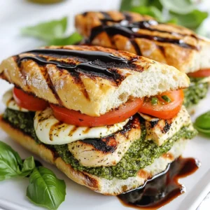 - 2 grilled chicken breasts, sliced - 1 cup basil pesto - 1 large ripe tomato, sliced - 1 cup fresh mozzarella, sliced - 4 ciabatta rolls The main ingredients create a tasty sandwich. Grilled chicken adds protein and flavor. Use fresh basil pesto for a rich taste. The ripe tomato gives a juicy burst. Fresh mozzarella melts perfectly, adding creaminess. Ciabatta rolls hold everything together with a nice crunch. - 2 tablespoons balsamic glaze - Fresh basil leaves for garnish - Olive oil for brushing - Salt and pepper to taste The additional ingredients add depth. Drizzling balsamic glaze brings sweetness and tang. Fresh basil leaves boost the flavor and look great. Brushing the rolls with olive oil ensures a golden toast. Salt and pepper enhance all the tastes. Each ingredient plays a key role in making this Chicken Pesto Caprese Sandwich a delight. {{ingredient_image_1}} First, grill your chicken breasts. Preheat your grill or grill pan on medium-high heat. Season the chicken with salt and pepper. Grill each breast for about 6-8 minutes per side. You want the juices to run clear. Once done, take the chicken off the grill. Let it rest for a few minutes. This step keeps the meat juicy. After resting, slice the chicken into thin pieces. Next, slice your ciabatta rolls in half. Brush the cut sides with olive oil. This adds flavor and helps with toasting. Place the rolls cut side down on the grill. Toast them for about 2-3 minutes until they turn golden and crispy. Keep an eye on them to avoid burning. Now it’s time to build your sandwich. Start with the bottom half of each toasted roll. Spread a generous layer of basil pesto on it. Then, add the sliced chicken on top of the pesto. Next, layer on the fresh tomato slices. Follow that with slices of fresh mozzarella. Drizzle balsamic glaze over the mozzarella for an extra kick. Finally, sprinkle fresh basil leaves on top. Place the other half of the roll on top to finish your sandwich. For an extra crispy sandwich, you can grill the assembled sandwich. Put the whole sandwich back on the grill for an additional 2-3 minutes on each side. This melts the cheese and gives a nice crunch. Once done, cut the sandwich in half and serve right away. To make sure your chicken is fully cooked, use a meat thermometer. The thickest part should reach 165°F (75°C). If you don't have a thermometer, cut into the chicken. The juices should run clear, not pink. For toasting ciabatta perfectly, brush the cut sides with olive oil. This helps achieve a golden and crispy texture. Grill them cut side down for 2-3 minutes. Keep an eye on them so they don’t burn. For a great presentation, serve the sandwiches on a wooden cutting board. Add extra basil leaves around the sandwiches for color. A small bowl of balsamic glaze looks nice for dipping. Pair these sandwiches with a fresh salad or crispy potato chips. A side of sweet potato fries also works well for a tasty combo. You can add spices to the chicken to boost flavor. Try garlic powder, paprika, or Italian herbs before grilling. These spices add depth to the taste. Other toppings can make your sandwich even better. Consider adding avocado slices or roasted red peppers. These add creaminess and a nice pop of color. Pro Tips Chicken Marinade: Marinate the chicken breasts in the basil pesto for at least 30 minutes before grilling to enhance flavor. Fresh Ingredients: Use fresh mozzarella and ripe tomatoes for the best taste and texture in your sandwich. Grilling Technique: For perfectly grilled chicken, use a meat thermometer; it should reach an internal temperature of 165°F (75°C). Serving Suggestion: Pair the sandwich with a simple side salad or sweet potato fries for a complete meal. {{image_2}} You can make a great vegetarian version of this sandwich. Just swap out the grilled chicken for roasted vegetables. Use veggies like zucchini, bell peppers, and eggplant. Roasting brings out their natural sweetness and flavor. Simply toss them in olive oil, salt, and pepper, then roast until tender. This option keeps the sandwich hearty and satisfying. The cheese can change the flavor of your sandwich. While fresh mozzarella is delicious, you can try other cheeses too. Goat cheese adds a tangy flavor that pairs well with basil. Cheddar gives a sharp taste that contrasts nicely with the pesto. Feel free to mix and match until you find your favorite cheese. Pesto doesn’t have to be just basil. You can try different types for a twist. Sun-dried tomato pesto brings a rich, sweet flavor. It adds a nice touch to the sandwich. Spinach pesto is another option; it’s fresh and vibrant. Both variations will make your Chicken Pesto Caprese Sandwich unique and exciting! To keep your Chicken Pesto Caprese Sandwich fresh, store leftovers properly. First, place the sandwich in an airtight container. This method protects it from odors and keeps it moist. If you want to store the sandwich for a longer time, consider separating the ingredients. Keep the grilled chicken, pesto, and veggies in different containers. Ensure the refrigerator is set to 40°F (4°C) or lower. This temperature helps prevent spoilage. Enjoy your leftovers within 2-3 days for the best taste. When you're ready to enjoy your sandwich again, reheating it properly is key. You can use a skillet or grill pan for the best results. Heat the pan over medium heat. Place the sandwich in the pan and cover it. Heat for about 3-5 minutes on each side. This method warms the sandwich evenly and keeps it crispy. If you're in a hurry, a microwave works too. Just place the sandwich on a microwave-safe plate and heat for 30 seconds. Check if it's warm, and add 15-second intervals if needed. If you want to freeze the sandwich, it’s best to freeze the parts separately. Wrap the grilled chicken in plastic wrap and place it in a freezer bag. You can also freeze the pesto in ice cube trays. Once frozen, transfer the cubes to a freezer bag. For the ciabatta rolls, wrap them tightly in foil or plastic wrap. When you’re ready to eat, thaw the chicken and pesto overnight in the fridge. Toast the ciabatta rolls fresh for a tasty sandwich! Yes, you can make this sandwich ahead of time. To do this, you should prepare the chicken and pesto first. After cooking the chicken, let it cool, then slice it. Store the sliced chicken in the fridge. For the ciabatta rolls, toast them just before serving. This keeps them fresh and crispy. You can also layer the pesto, chicken, tomato, and mozzarella in advance. Just add the balsamic glaze and fresh basil right before eating. This way, your sandwich stays tasty and vibrant. If you can't find ciabatta rolls, there are great alternatives. You can use: - Baguette - Sourdough bread - Whole grain rolls - Focaccia These breads offer different textures and flavors. Pick one that you enjoy most! Making your own basil pesto is simple and fun. Here is a quick recipe: 1. Ingredients: - 2 cups fresh basil leaves - ½ cup olive oil - ⅓ cup pine nuts (or walnuts) - ½ cup grated Parmesan cheese - 2 cloves garlic - Salt to taste 2. Instructions: - Add basil, garlic, and nuts to a food processor. - Pulse until finely chopped. - With the processor running, slowly pour in olive oil. - Scrape down the sides and blend until smooth. - Stir in cheese and salt. This homemade pesto adds fresh flavor to your sandwich! The Chicken Pesto Caprese Sandwich is both tasty and nutritious. Here’s a basic breakdown per sandwich: - Calories: About 450 - Protein: 30g - Carbohydrates: 40g - Fat: 20g - Fiber: 3g This meal provides a good mix of protein and healthy fats. It’s filling without being too heavy, making it perfect for lunch or dinner. Enjoy your delicious creation! This blog post covered how to make a delicious sandwich with grilled chicken, fresh basil pesto, and mozzarella. You learned about key ingredients, step-by-step assembly, and tips for perfecting your dish. Remember, you can switch ingredients for variations or store leftovers properly. With these ideas, you can create a tasty meal that suits your tastes. Enjoy sharing this sandwich with friends and family!
