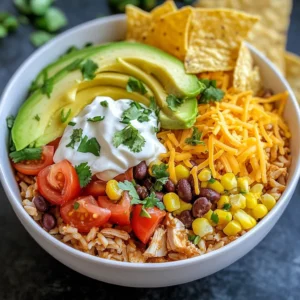 - 1.5 lbs boneless, skinless chicken breasts - 1 cup brown rice, rinsed - 1 can (15 oz) black beans, drained and rinsed - 1 can (14.5 oz) diced tomatoes with green chilies - 1 cup corn (fresh or frozen) - 1 small onion, diced - 2 cloves garlic, minced - 2 teaspoons chili powder - 1 teaspoon cumin - 1 teaspoon smoked paprika - Salt and pepper to taste - 1 cup chicken broth - 1 lime, juiced - Fresh cilantro, chopped (for garnish) - Avocado slices (for topping) - Sour cream (for topping) - Shredded cheese (for topping) For the best flavor, I suggest using brands like: - Chicken: Perdue or Tyson are both reliable for quality chicken. - Canned Goods: Goya for black beans and diced tomatoes, as they have great taste and quality. - Rice: Uncle Ben’s brown rice cooks well and has a nice texture. - Spices: McCormick provides fresh spices that enhance flavor. If you need to make swaps, consider these options: - Rice: Quinoa works well instead of brown rice for a gluten-free option. - Beans: Use pinto beans if you prefer a different flavor. - Corn: Canned corn can replace fresh corn if needed. - Lime: Lemon juice can be a good substitute for lime if you don’t have it. Using these ingredients will give you a tasty and easy meal. You can mix and match based on your pantry items or personal taste. Enjoy crafting your delicious Slow Cooker Chicken Burrito Bowls! {{ingredient_image_1}} First, gather your ingredients. You need chicken, rice, beans, tomatoes, corn, onion, garlic, and spices. Start by placing 1.5 lbs of boneless, skinless chicken breasts at the bottom of your slow cooker. Next, in a bowl, mix 1 cup of rinsed brown rice, 1 can of drained black beans, 1 can of diced tomatoes with green chilies, and 1 cup of corn. Add 1 small diced onion, 2 minced cloves of garlic, 2 teaspoons of chili powder, 1 teaspoon of cumin, and 1 teaspoon of smoked paprika. Don't forget to season with salt and pepper. Stir well to combine. Now, spread the rice and bean mixture over the chicken in the slow cooker. Pour in 1 cup of chicken broth, making sure the rice and beans are covered with liquid. Cover the slow cooker and set it to cook on low for 6-8 hours or on high for 3-4 hours. Check that the chicken is fully cooked and tender before moving on to the next step. About 30 minutes before serving, use two forks to shred the chicken while it’s still in the cooker. Mix everything well to combine the flavors. Squeeze the juice of 1 lime into the mixture and stir again to enhance the taste. This simple step brings brightness to the dish. Enjoy your flavorful and easy slow cooker chicken burrito bowls! To cook rice well in a slow cooker, rinse it first. Rinsing removes extra starch. This helps the rice cook evenly. Use a ratio of 1 cup of rice to 2 cups of liquid. For our dish, use chicken broth for great taste. Mix the rice in with the other ingredients. It will absorb all the flavors as it cooks. You can adjust the spices to fit your taste. If you like heat, add more chili powder or even some diced jalapeños. For a smoky flavor, try more smoked paprika. Remember to taste as you go. This way, you can find the right mix for your palate. Adding a pinch of salt enhances all the flavors too. To get tender chicken, start with quality meat. Boneless, skinless chicken breasts work best. Place them at the bottom of the cooker. This way, they soak up the juices. Cook on low for 6-8 hours for the best results. If you’re short on time, the high setting works too but may not be as tender. Shredding the chicken halfway through cooking helps it mix well with the rice and beans. Pro Tips Use Fresh Ingredients: Fresh cilantro and ripe avocados will enhance the flavors and freshness of your burrito bowls, making them even more delicious. Adjust Spice Levels: If you prefer a spicier dish, consider adding jalapeños or increasing the amount of chili powder to suit your taste. Meal Prep Friendly: This recipe is perfect for meal prepping! Store individual portions in airtight containers for quick and easy lunches throughout the week. Customize Your Toppings: Feel free to get creative with toppings! Add diced tomatoes, sliced olives, or even a sprinkle of hot sauce for an extra kick. {{image_2}} You can easily make this dish vegetarian. Simply swap the chicken for extra beans or lentils. Use the same spices for flavor. Add more veggies like bell peppers and zucchini. This change keeps the dish hearty and satisfying. If you love heat, add diced jalapeños or serrano peppers. Stir them into the rice and bean mix. You can also use spicy diced tomatoes instead of regular ones. This will give your burrito bowl a nice kick. Adjust the spices to match your taste. For a Southwest twist, try adding black olives or diced avocado. You can also mix in some corn salsa for extra flavor. Top your bowl with fresh pico de gallo or a drizzle of chipotle sauce. These add-ins will enhance the vibrant flavors and textures. After enjoying your Slow Cooker Chicken Burrito Bowls, store any leftovers in an airtight container. Make sure to let the dish cool down first. This helps keep the flavors fresh and prevents sogginess. Keep the leftovers in the fridge for up to 3 days. To avoid mixing textures, store toppings like avocado and sour cream separately. When you're ready to enjoy your leftovers, reheat them in the microwave. Place the burrito bowl mixture in a microwave-safe dish. Cover it with a damp paper towel to keep the moisture in. Heat for 1-2 minutes, stirring halfway through. Check if it's hot enough before serving. You can also reheat it on the stove. Just warm it over low heat, stirring often. If you've made a big batch, you can freeze the burrito bowls for later. Portion the mixture into freezer-safe containers. Leave some space at the top, as the food will expand when frozen. They can stay good for up to 3 months. To thaw, move the container to the fridge overnight. Reheat it using the steps above, and enjoy a quick meal anytime! Yes, you can use frozen chicken. Just add an extra hour to the cooking time. You want it to be fully cooked and tender. It will still absorb all the great flavors from the spices and other ingredients. Make sure to check that the chicken reaches 165°F for safety. To make this recipe gluten-free, use gluten-free brown rice. Also, check that your chicken broth is gluten-free. Most canned beans and tomatoes are safe, but always read the labels. This way, you can enjoy the burrito bowl without any worries! Burrito bowls are great on their own but pairing them adds fun! You can serve tortilla chips on the side for crunch. A fresh salad with lime dressing works well too. Think about adding sliced jalapeños or a side of guacamole for some heat and flavor. Enjoy your meal! In this post, I covered the key ingredients for tasty burrito bowls, from brands to substitutions. You learned step-by-step cooking methods, tips for perfect rice, and ways to add spice. I also shared variations, including vegetarian options and storage tips. To sum up, you now have all the tools to create delicious burrito bowls your way. Enjoy your cooking and share your tasty results!