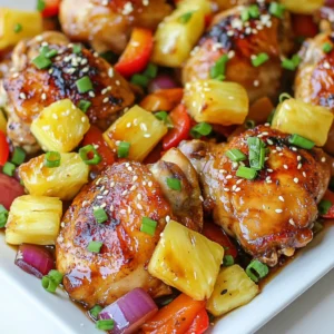 - 4 boneless, skinless chicken thighs - 1 can (20 oz) pineapple chunks, drained (reserve juice) - 1 red bell pepper, sliced - 1 green bell pepper, sliced - 1 red onion, sliced - 3 cloves garlic, minced - 1 tablespoon fresh ginger, grated - 2 tablespoons soy sauce - 2 tablespoons olive oil - 1 tablespoon honey - 1 teaspoon sesame oil - Salt and pepper to taste - Chopped green onions and sesame seeds for garnish For this recipe, you need: - 4 chicken thighs (about 1.5 pounds) - 1 can of pineapple (20 oz) - 1 red bell pepper - 1 green bell pepper - 1 red onion - 3 cloves of garlic - 1 tablespoon of ginger - 2 tablespoons soy sauce - 2 tablespoons olive oil - 1 tablespoon honey - 1 teaspoon sesame oil - Salt and pepper to taste Preparation methods include: - Slice the bell peppers and onion. - Mince the garlic. - Grate the ginger. If you want to switch things up, consider these options: - Use chicken breasts instead of thighs for a leaner choice. - Try firm tofu or shrimp for a different protein. - Use seasonal veggies like zucchini or snap peas for fresh flavor. - Swap pineapple for mango for a unique twist. {{ingredient_image_1}} Preheating the oven First, set your oven to 425°F (220°C). This high heat helps the chicken cook quickly and stay juicy. Marinating process In a bowl, mix the reserved pineapple juice, soy sauce, olive oil, honey, minced garlic, grated ginger, sesame oil, salt, and pepper. This marinade adds great flavor. Place the chicken thighs in a zip-top bag and pour half of the marinade over them. Seal the bag tight. Let it marinate in the fridge for at least 30 minutes. If you have time, two hours will give even more taste. Combining ingredients in a bowl In another large bowl, add the sliced red and green bell peppers, red onion, and pineapple chunks. Pour the rest of the marinade over the veggies and fruit. Tossing methods for even coating Use your hands or a spoon to toss everything well. This step ensures every piece is covered in the tasty marinade. Arranging ingredients on the sheet pan Now, take the marinated chicken from the bag and place it in the middle of the sheet pan. Arrange the vegetable and pineapple mix around the chicken. Cooking times and temperatures Bake everything in the oven for 25-30 minutes. The chicken is done when it reaches an internal temperature of 165°F (75°C). Optional broiling steps for caramelization For a crispy finish, broil the dish for an extra 2-3 minutes. This step adds a nice char to the chicken and veggies, making them even more delicious. For great flavor, marinate the chicken for 30 minutes to 2 hours. This time helps the chicken soak in all the tasty juices. If you marinate too long, the chicken can become mushy. A good rule is to stick to the 2-hour mark. Always keep the chicken in the fridge while it marinates. To know when your chicken is done, check its internal temperature. It should reach 165°F (75°C). You can use a meat thermometer for accuracy. If you don’t have one, look for clear juices when you cut into the chicken. If the juices run clear, it’s ready! Also, the meat should be firm and no longer pink. For a fun presentation, serve the chicken right from the sheet pan. This brings a family-style feel to your meal. You can also plate the chicken over rice for a nice touch. Drizzle some extra marinade on top for flavor. Finally, sprinkle chopped green onions and sesame seeds to add color and texture to your dish. Pro Tips Marinate for Maximum Flavor: Letting the chicken marinate for at least 2 hours (or overnight) enhances the flavor and tenderness of the meat. Use Fresh Ingredients: Fresh garlic and ginger can significantly elevate the dish's flavor profile compared to dried versions. Customize Your Veggies: Feel free to add other colorful vegetables like zucchini or snap peas for added texture and nutrition. Perfectly Cooked Chicken: Ensure your chicken reaches an internal temperature of 165°F (75°C) for safe consumption and optimal juiciness. {{image_2}} You can easily switch out the protein in this dish. If you want a plant-based option, try tofu. Tofu soaks up the marinade well, giving you great flavor. If you prefer seafood, shrimp works nicely too. Just remember, shrimp cooks faster than chicken. For veggies, use what’s in season. Zucchini, asparagus, or broccoli can add a fun twist to this recipe. To boost the flavor, add some spices or herbs. A pinch of red pepper flakes can add heat. Fresh cilantro or basil can also enhance the dish. You can try different sauces too. For a kick, use teriyaki or sweet chili sauce. If you want a tangy flavor, a splash of lime juice can work wonders. This meal pairs well with rice, salad, or grains. Serve it over fluffy jasmine rice for a tasty combo. You can also try it with quinoa for a healthy twist. If you have leftovers, get creative! Shred the chicken and use it in tacos or wraps. You can also toss it in a salad for a quick lunch. Store any leftover Hawaiian chicken in an airtight container. This keeps it fresh and tasty. You can keep it in the fridge for up to four days. Always let it cool before sealing. This helps prevent moisture buildup. To freeze, place the chicken and veggies in a freezer-safe bag. Remove as much air as possible. This helps prevent freezer burn. You can freeze it for up to three months. When ready to eat, thaw it in the fridge overnight. Reheat in the oven at 350°F (175°C) until hot. This recipe is great for meal prep. You can make a double batch and store it. Divide into portions for easy lunches or dinners. Cook once and enjoy multiple meals! It saves time and keeps you on track with healthy eating. Yes, you can use chicken breasts. However, chicken thighs have more fat, which gives them a juicier flavor. Thighs also stay tender when cooked. Breasts can dry out if overcooked. If you prefer breasts, check the cooking time closely. The ideal marinating time is 30 minutes to 2 hours. This helps the chicken soak in the flavors. If you are short on time, even 30 minutes will add a nice taste. For the best results, aim for 1 to 2 hours. You can serve Hawaiian chicken with many sides. Here are some great options: - Steamed rice or jasmine rice - Quinoa for a healthy choice - A fresh green salad - Grilled vegetables for extra flavor - Coconut rice for a tropical twist These sides complement the sweet and savory chicken well. In this post, I covered key ingredients for Hawaiian chicken, preparation steps, and helpful tips. You learned how to effectively marinate and cook chicken thighs, as well as alternative ingredients to try. Remember, the right preparation and serving can elevate your dish. Feel free to experiment with flavors and sides that suit your taste. Enjoy creating your own delicious version of this meal!