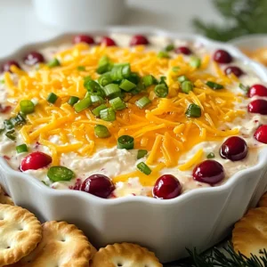 - 8 oz cream cheese, softened - 1 cup fresh cranberries, chopped - 1 jalapeño, seeded and finely diced - ¼ cup green onions, chopped - ½ cup shredded sharp cheddar cheese The main ingredients form the base of this dip. Cream cheese gives it a rich and smooth texture. Fresh cranberries add a tartness that balances the spice. The jalapeño brings heat, while the green onions offer a fresh crunch. Sharp cheddar cheese adds depth and flavor. - ¼ cup honey - 1 teaspoon lemon juice - Salt and pepper, to taste The additional ingredients enhance the dip's taste. Honey sweetens the mix, creating a nice contrast to the jalapeño. Lemon juice brightens the flavors. Salt and pepper are key for seasoning. Adjust these to suit your taste. - Crackers - Sliced baguette For serving, I love pairing this dip with crunchy crackers or soft sliced baguette. Both options add a fun texture. You can also try veggies like cucumber slices or bell peppers for a fresh twist. {{ingredient_image_1}} 1. First, take 8 oz of softened cream cheese. Place it in a medium bowl. 2. Beat the cream cheese until it is smooth and creamy. This step is key for a great dip. 3. Next, fold in 1 cup of chopped fresh cranberries. 4. Add in 1 diced jalapeño, making sure to remove the seeds for less heat. 5. Toss in ¼ cup of chopped green onions. Mix these ingredients well. 6. Stir in ½ cup of shredded sharp cheddar cheese. 7. Now, add ¼ cup of honey and 1 teaspoon of lemon juice. Mix until everything is combined. 8. Season with salt and pepper to taste. If you want it sweeter, adjust the honey. Chilling the dip is very important. It allows the flavors to mix together. A minimum of 30 minutes in the fridge is best. This step makes the dip even more tasty. For serving, presentation matters. Transfer the dip to a nice serving dish. I like to serve it with crackers or sliced baguette. Arrange these around the dip for a beautiful look. Enjoy the mix of creamy, sweet, and spicy flavors! Achieving a creamy consistency is key for this dip. Start with softened cream cheese. This makes mixing easy and smooth. Beat it well until no lumps remain. You want it light and fluffy. When you add the cranberries and jalapeños, fold gently. This keeps your dip creamy. Overmixing can make it dense. Balancing sweetness and spice is crucial. The honey adds a nice sweetness. Start with a quarter cup and taste. If you like it sweeter, add more honey. The jalapeño gives heat, so adjust to your taste. Remove the seeds to reduce spice. If you love heat, leave them in. A little lemon juice brightens the flavor. Always season with salt and pepper to enhance the taste. Chilling time is important for the best flavor. After mixing, cover the dip. Place it in the fridge for at least 30 minutes. This allows the flavors to meld nicely. If you have time, chill it longer. The longer it sits, the better it tastes. Serve it cold for a refreshing bite. Enjoy with crackers or sliced baguette for a perfect snack! Pro Tips Chill for Best Flavor: Allow the dip to chill for at least 30 minutes before serving. This resting time lets the flavors meld together, enhancing the overall taste. Adjust the Heat: If you prefer a milder dip, use only half of the jalapeño or remove the seeds and membranes where the heat is concentrated. Experiment with Cheese: Try swapping the sharp cheddar for another cheese like pepper jack for an extra kick or cream cheese for a creamier texture. Perfect Pairings: Serve with a variety of crackers or sliced baguette to cater to different tastes and add a nice crunch to the creamy dip. {{image_2}} You can switch up the cheese in this dip. Try using goat cheese for a tangy twist. Creamy mozzarella offers a mild taste that blends well. If you want a sharper flavor, use a blue cheese. Each option gives a new spin to the dip while keeping it creamy. If you need gluten-free options, serve this dip with rice crackers or veggie sticks. For a vegan version, swap cream cheese for a plant-based cream cheese. Use maple syrup instead of honey to keep it sweet. These adjustments make the dip fit many diets. Add other fruits for a unique flavor. Diced apples or pears bring a nice crunch. You can also mix in spices like cumin for warmth or garlic powder for depth. Get creative! Each mix-in changes the dip, making it your own special dish. To store leftover cranberry jalapeño cream cheese dip, use an airtight container. Make sure the lid fits tightly. This keeps the dip fresh and prevents it from absorbing other smells in the fridge. You can also press plastic wrap directly onto the dip before sealing the container. This adds another layer of protection. The dip lasts up to five days in the fridge. After that, its taste and texture may change. If you notice any off smell or color, toss it away. Always check before you eat leftovers. For reheating, use the microwave or oven. If you choose the microwave, heat in 30-second bursts. Stir in between bursts to keep it smooth. If using an oven, cover the dip with foil and heat at 350°F for about 15 minutes. This keeps the dip creamy and delicious without drying it out. Enjoy! Yes, you can use frozen cranberries. They work well in this dip. Thaw them first. Make sure to drain any excess water. This keeps the dip thick. If not, the dip may become too watery. The heat comes from the jalapeño. It adds a nice kick. If you like it mild, remove the seeds. For more heat, leave some seeds in. You can also add more jalapeño for extra spice. Yes, you can prepare this dip ahead of time. Make it a day before your event. Store it in the fridge in an airtight container. This allows the flavors to blend better. Just remember to chill it for at least 30 minutes before serving. This blog post covers making a creamy cranberry dip that dazzles. We discussed the main ingredients, like cream cheese and fresh cranberries, plus tips for flavor and texture. You learned about serving suggestions and variations, including gluten-free options. Storing tips ensure you enjoy leftovers without waste. Remember, chilling the dip is key for the best taste. Try fun mix-ins to make it your own. Enjoy your tasty dip, and impress your friends!