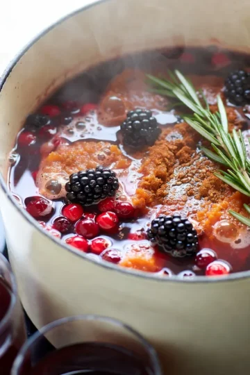 To make Poisoned Apple Cider, you need these key items: - 4 cups apple cider - 1 small pumpkin, peeled and cubed - 2 cups dark red cranberries (fresh or frozen) - 1 teaspoon cinnamon - 1 teaspoon nutmeg - 1 teaspoon allspice These ingredients work together to create a warm, cozy drink. The apple cider forms the base. The pumpkin adds creaminess. Cranberries give a tart taste. Spices like cinnamon and nutmeg add warmth. Allspice adds depth, making this drink special. You can use these optional items to enhance the flavor: - 1 tablespoon brown sugar (optional) - 1 tablespoon vanilla extract Adding brown sugar can sweeten the cider a bit. Vanilla extract adds a nice aroma. These ingredients can make your cider taste even better. Feel free to adjust them based on your taste. Presentation is key for this spooky drink! For a fun touch, use: - 1/2 cup blackberries for garnish - Sprigs of rosemary for garnish Blackberries add a pop of color. Rosemary looks like little witchy sprigs. These garnishes make your cider look festive and inviting. Serve in spooky mugs for an extra thrill! {{ingredient_image_1}} To start, gather your ingredients. You need: - 4 cups apple cider - 1 small pumpkin, peeled and cubed - 2 cups dark red cranberries (fresh or frozen) - 1 teaspoon cinnamon - 1 teaspoon nutmeg - 1 teaspoon allspice - 1 tablespoon brown sugar (optional) - 1 tablespoon vanilla extract In a large pot, combine the apple cider, cubed pumpkin, and cranberries. The pumpkin adds a nice texture. The cranberries bring a tart balance. Next, add the cinnamon, nutmeg, allspice, and brown sugar if you choose. Stir well to mix everything together. Now, heat the pot over medium heat. Watch closely until it starts to simmer. This usually takes about 5 to 10 minutes. Once it simmers, reduce the heat to low and cover the pot. Let it simmer for about 30 minutes. This step is key. It lets the flavors meld together beautifully. You’ll notice a lovely aroma filling your kitchen. After 30 minutes, you need to blend the mixture. Use an immersion blender to puree it until smooth. If you don’t have one, transfer it to a regular blender. Do this in small batches to avoid spills. Once blended, return the smooth mixture to the pot. Stir in the vanilla extract for an extra layer of flavor. Heat it for another 10 minutes to warm it through. Now your poisoned apple cider is ready to serve! To make the best poisoned apple cider, balance is key. The tartness of cranberries goes well with sweet apple cider. Use fresh or frozen cranberries. The pumpkin adds creaminess and a rich taste. Spices like cinnamon, nutmeg, and allspice bring warmth. If you want more sweetness, add brown sugar. This helps round out the flavors. Don’t forget the vanilla extract! It enhances the overall taste and aroma. Using the right equipment helps achieve the best cider. A large pot is essential for cooking the mixture. An immersion blender makes it easy to puree the cider smoothly. If you don’t have one, a regular blender works too. Just be careful when transferring hot liquid. Prepare heat-resistant mugs for serving. They keep your drink warm and look great too. Make your cider look as good as it tastes! Serve it in spooky mugs. For extra flair, add blackberries on top. They look like little dark gems. A sprig of rosemary adds a creepy touch. For a foggy effect, place dry ice in a separate container. This gives the cider a bubbling potion look. Your guests will love the spooky vibe! Pro Tips Choose Fresh Ingredients: Opt for fresh cranberries and seasonal pumpkins to enhance the flavor and quality of your cider. Adjust Sweetness: Taste the mixture before serving and adjust the sweetness by adding more brown sugar if desired, depending on your taste preference. Garnish Creatively: Use additional spooky garnishes like gummy worms or spooky-shaped ice cubes to make your presentation even more festive. Make Ahead: This cider can be made a day in advance. Just reheat gently before serving, allowing the flavors to deepen even more. {{image_2}} You can change the flavor of your poisoned apple cider by swapping or adding ingredients. Try using pear cider instead of apple cider for a different taste. You can also add a splash of orange juice for a zesty twist. Want some spice? Toss in a few cloves or a slice of fresh ginger. These simple swaps can make your drink unique and fun. You can enjoy poisoned apple cider in two ways. For a non-alcoholic drink, just follow the recipe as is. It’s perfect for kids and anyone who wants a tasty treat. If you want a kick, try adding rum or bourbon. Just mix in about a cup when you heat the cider. This gives it a warm, cozy feel for adults. You can make your cider special for any holiday. For Halloween, keep the spooky theme with creepy garnishes like gummy worms or spooky mugs. During Thanksgiving, focus on flavors like maple syrup or caramel. For Christmas, add some peppermint extract or even some cranberries on top for a festive look. These variations keep your poisoned apple cider fun and fresh all year round! Store your poisoned apple cider in a clean glass jar or airtight container. Make sure it cools to room temperature first. Label the container with the date. This helps you remember when you made it. Keep it in the fridge to stay fresh. Avoid metal containers as they can change the flavor. When stored properly, your poisoned apple cider can last up to five days in the fridge. After that, it may spoil. Always check for any off smells or changes in color. If it looks or smells bad, throw it out. Safety first! When reheating, do it on low heat. This helps keep the flavors intact. Stir often to avoid hot spots. Heat until it is warm but not boiling. If you have leftovers, never reheat more than once. Enjoy your spooky drink safely! If apple cider is poisoned, you may feel sick. Common symptoms include nausea, vomiting, and stomach pain. You might also have headaches or dizziness. In serious cases, you could feel confused or have trouble breathing. If you notice any of these signs after drinking cider, seek help fast. To check if apple cider is safe, start with your senses. Look for strange colors or floating bits. Smell it; if it smells off, do not drink it. Taste a small amount. If it tastes sour or strange, it might be bad. Always buy cider from a trusted source to stay safe. If you think the cider is poisoned, stop drinking it right away. Call poison control or seek medical help. Tell them what you drank and when. Keep the cider container for testing if needed. Do not wait for symptoms to appear; act quickly! Yes, there have been news stories about poisoned apple cider. Some cases involved people getting sick after drinking unregulated cider from local farms. These cases remind us to be careful when enjoying seasonal drinks. Always check where your cider comes from to ensure it is safe. In this blog post, we covered the core ingredients for a tasty apple cider. You learned step-by-step how to prepare and simmer it to boost flavor. We also discussed tips for the best taste and fun ways to serve it. Variations let you create seasonal drinks too. Lastly, we tackled storage tips and answered common questions about cider safety. Enjoy your delicious apple cider, and remember, safety first!