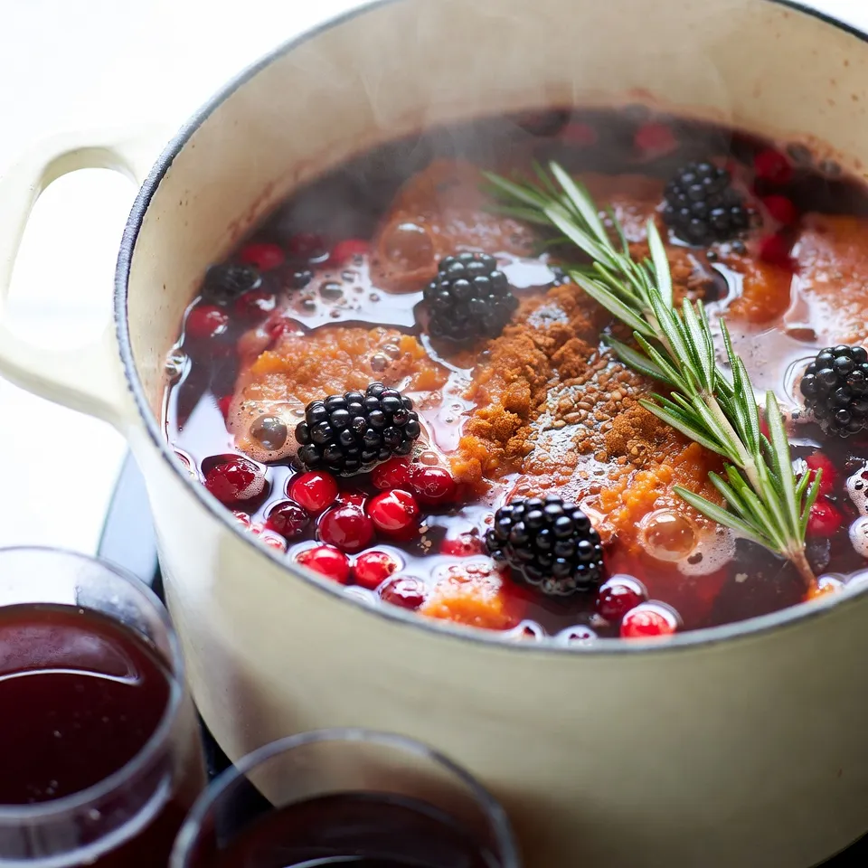 To make Poisoned Apple Cider, you need these key items: - 4 cups apple cider - 1 small pumpkin, peeled and cubed - 2 cups dark red cranberries (fresh or frozen) - 1 teaspoon cinnamon - 1 teaspoon nutmeg - 1 teaspoon allspice These ingredients work together to create a warm, cozy drink. The apple cider forms the base. The pumpkin adds creaminess. Cranberries give a tart taste. Spices like cinnamon and nutmeg add warmth. Allspice adds depth, making this drink special. You can use these optional items to enhance the flavor: - 1 tablespoon brown sugar (optional) - 1 tablespoon vanilla extract Adding brown sugar can sweeten the cider a bit. Vanilla extract adds a nice aroma. These ingredients can make your cider taste even better. Feel free to adjust them based on your taste. Presentation is key for this spooky drink! For a fun touch, use: - ½ cup blackberries for garnish - Sprigs of rosemary for garnish Blackberries add a pop of color. Rosemary looks like little witchy sprigs. These garnishes make your cider look festive and inviting. Serve in spooky mugs for an extra thrill! {{ingredient_image_1}} To start, gather your ingredients. You need: - 4 cups apple cider - 1 small pumpkin, peeled and cubed - 2 cups dark red cranberries (fresh or frozen) - 1 teaspoon cinnamon - 1 teaspoon nutmeg - 1 teaspoon allspice - 1 tablespoon brown sugar (optional) - 1 tablespoon vanilla extract In a large pot, combine the apple cider, cubed pumpkin, and cranberries. The pumpkin adds a nice texture. The cranberries bring a tart balance. Next, add the cinnamon, nutmeg, allspice, and brown sugar if you choose. Stir well to mix everything together. Now, heat the pot over medium heat. Watch closely until it starts to simmer. This usually takes about 5 to 10 minutes. Once it simmers, reduce the heat to low and cover the pot. Let it simmer for about 30 minutes. This step is key. It lets the flavors meld together beautifully. You’ll notice a lovely aroma filling your kitchen. After 30 minutes, you need to blend the mixture. Use an immersion blender to puree it until smooth. If you don’t have one, transfer it to a regular blender. Do this in small batches to avoid spills. Once blended, return the smooth mixture to the pot. Stir in the vanilla extract for an extra layer of flavor. Heat it for another 10 minutes to warm it through. Now your poisoned apple cider is ready to serve! To make the best poisoned apple cider, balance is key. The tartness of cranberries goes well with sweet apple cider. Use fresh or frozen cranberries. The pumpkin adds creaminess and a rich taste. Spices like cinnamon, nutmeg, and allspice bring warmth. If you want more sweetness, add brown sugar. This helps round out the flavors. Don’t forget the vanilla extract! It enhances the overall taste and aroma. Using the right equipment helps achieve the best cider. A large pot is essential for cooking the mixture. An immersion blender makes it easy to puree the cider smoothly. If you don’t have one, a regular blender works too. Just be careful when transferring hot liquid. Prepare heat-resistant mugs for serving. They keep your drink warm and look great too. Make your cider look as good as it tastes! Serve it in spooky mugs. For extra flair, add blackberries on top. They look like little dark gems. A sprig of rosemary adds a creepy touch. For a foggy effect, place dry ice in a separate container. This gives the cider a bubbling potion look. Your guests will love the spooky vibe! Pro Tips Choose Fresh Ingredients: Opt for fresh cranberries and seasonal pumpkins to enhance the flavor and quality of your cider. Adjust Sweetness: Taste the mixture before serving and adjust the sweetness by adding more brown sugar if desired, depending on your taste preference. Garnish Creatively: Use additional spooky garnishes like gummy worms or spooky-shaped ice cubes to make your presentation even more festive. Make Ahead: This cider can be made a day in advance. Just reheat gently before serving, allowing the flavors to deepen even more. {{image_2}} You can change the flavor of your poisoned apple cider by swapping or adding ingredients. Try using pear cider instead of apple cider for a different taste. You can also add a splash of orange juice for a zesty twist. Want some spice? Toss in a few cloves or a slice of fresh ginger. These simple swaps can make your drink unique and fun. You can enjoy poisoned apple cider in two ways. For a non-alcoholic drink, just follow the recipe as is. It’s perfect for kids and anyone who wants a tasty treat. If you want a kick, try adding rum or bourbon. Just mix in about a cup when you heat the cider. This gives it a warm, cozy feel for adults. You can make your cider special for any holiday. For Halloween, keep the spooky theme with creepy garnishes like gummy worms or spooky mugs. During Thanksgiving, focus on flavors like maple syrup or caramel. For Christmas, add some peppermint extract or even some cranberries on top for a festive look. These variations keep your poisoned apple cider fun and fresh all year round! Store your poisoned apple cider in a clean glass jar or airtight container. Make sure it cools to room temperature first. Label the container with the date. This helps you remember when you made it. Keep it in the fridge to stay fresh. Avoid metal containers as they can change the flavor. When stored properly, your poisoned apple cider can last up to five days in the fridge. After that, it may spoil. Always check for any off smells or changes in color. If it looks or smells bad, throw it out. Safety first! When reheating, do it on low heat. This helps keep the flavors intact. Stir often to avoid hot spots. Heat until it is warm but not boiling. If you have leftovers, never reheat more than once. Enjoy your spooky drink safely! If apple cider is poisoned, you may feel sick. Common symptoms include nausea, vomiting, and stomach pain. You might also have headaches or dizziness. In serious cases, you could feel confused or have trouble breathing. If you notice any of these signs after drinking cider, seek help fast. To check if apple cider is safe, start with your senses. Look for strange colors or floating bits. Smell it; if it smells off, do not drink it. Taste a small amount. If it tastes sour or strange, it might be bad. Always buy cider from a trusted source to stay safe. If you think the cider is poisoned, stop drinking it right away. Call poison control or seek medical help. Tell them what you drank and when. Keep the cider container for testing if needed. Do not wait for symptoms to appear; act quickly! Yes, there have been news stories about poisoned apple cider. Some cases involved people getting sick after drinking unregulated cider from local farms. These cases remind us to be careful when enjoying seasonal drinks. Always check where your cider comes from to ensure it is safe. In this blog post, we covered the core ingredients for a tasty apple cider. You learned step-by-step how to prepare and simmer it to boost flavor. We also discussed tips for the best taste and fun ways to serve it. Variations let you create seasonal drinks too. Lastly, we tackled storage tips and answered common questions about cider safety. Enjoy your delicious apple cider, and remember, safety first!