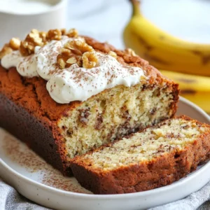 - 3 ripe bananas, mashed - 1 cup Greek yogurt (plain, unsweetened) - 2 large eggs - ½ cup honey or maple syrup - ¼ cup melted coconut oil (or vegetable oil) - 1 teaspoon vanilla extract - 1 teaspoon baking soda - ½ teaspoon baking powder - ½ teaspoon salt - 1 teaspoon ground cinnamon - 1 ½ cups all-purpose flour - ½ cup chopped walnuts or pecans - ½ cup dark chocolate chips The key to this Greek yogurt banana bread lies in the balance of flavors and textures. The ripe bananas give it sweetness and moisture. The Greek yogurt adds creaminess and a slight tang, making your bread rich and soft. This recipe uses two eggs for binding and structure. Honey or maple syrup serves as a natural sweetener, which you can adjust to fit your taste. Coconut oil brings a lovely richness, but you can swap it with vegetable oil if you prefer. For the dry mix, baking soda and baking powder make the bread rise. Salt enhances all the flavors, while cinnamon adds warmth. Finally, all-purpose flour gives the bread its structure. Feel free to customize your banana bread! Adding walnuts or dark chocolate chips can transform the flavor and texture. You can mix and match to create your perfect loaf. {{ingredient_image_1}} - Preheat your oven to 350°F (175°C). - Grease or line a 9x5-inch loaf pan. - In a large bowl, combine the mashed bananas, Greek yogurt, eggs, honey (or maple syrup), melted coconut oil, and vanilla extract. - Whisk everything until smooth and well-combined. - In another bowl, whisk together the baking soda, baking powder, salt, ground cinnamon, and all-purpose flour. - Gradually fold the dry ingredients into the wet mixture. Mix until just combined. - If you like, fold in walnuts or dark chocolate chips. - Pour the batter into the prepared loaf pan and smooth the top. - Bake for 50-60 minutes. Check doneness with a toothpick; it should come out clean. - Don't over-mix the batter. This keeps your bread light and fluffy. - Let the ingredients come to room temperature before mixing. Cold ingredients can make the bread dense. - Experiment with adding vanilla extract or spices to boost flavor. A little can go a long way! - Add a pinch of nutmeg for additional warmth. It gives a nice touch to the overall taste. - Cool in the pan for 10 minutes before transferring to a wire rack. This helps it set properly. - Serve warm or at room temperature. Enjoy it plain or with a dollop of Greek yogurt for extra creaminess. Pro Tips Use Overripe Bananas: The riper the bananas, the sweeter and more flavorful your banana bread will be. Look for bananas with brown spots for optimal sweetness. Don’t Overmix the Batter: Mix the wet and dry ingredients until just combined to ensure a tender loaf. Overmixing can lead to a dense texture. Add Flavor Variations: Consider adding nuts, chocolate chips, or spices like nutmeg for extra flavor. Make it your own by experimenting with different mix-ins! Cool Properly: Let the banana bread cool in the pan for a few minutes before transferring it to a wire rack. This helps maintain its structure and prevents sogginess. {{image_2}} You can make simple swaps to boost the health factor of your Greek yogurt banana bread. - Replace honey with agave syrup for a lower glycemic option. - Use whole wheat flour instead of all-purpose flour. Whole wheat flour adds fiber and nutrients. Get creative with flavors to make your banana bread unique. - Add dried fruit like raisins or cranberries for extra sweetness. - Incorporate zests like lemon or orange for a fresh twist. The zests bring brightness to the dish. You can modify the recipe to fit different diets. - Make it vegan by swapping eggs with flaxseed meal mixed with water. - Use maple syrup instead of honey for a plant-based sweetener. These changes keep the bread moist and tasty. Let the bread cool completely before storing. This helps keep the texture nice. Once cool, store it in an airtight container at room temperature. The bread stays fresh for up to 3 days. For long-term storage, freeze slices of banana bread. Wrap each slice in plastic wrap, then in foil. This helps keep the bread from getting freezer burn. You can freeze it for up to 3 months. When ready to eat, thaw it in the refrigerator or at room temperature. To enjoy your banana bread warm, you can microwave it for a few seconds. Alternatively, toast slices for a warm treat. Both methods bring back that fresh-baked taste. Enjoy! Yes, you can use frozen bananas. Just thaw them first. Drain any extra liquid after thawing. This way, your banana bread stays moist and tasty. If you don’t have Greek yogurt, plain yogurt works well. You can also use applesauce for a lighter option. Both will keep your bread moist and delicious. You can replace eggs easily. Mix flaxseed meal with water as a substitute. A commercial egg replacer also works. Both options keep your banana bread fluffy. To check if your banana bread is ready, insert a toothpick into the center. If it comes out clean or with a few moist crumbs, your bread is done. This simple test ensures perfect baking every time. In this post, I covered how to make delicious banana bread, detailing its main and dry ingredients, and offering step-by-step instructions. I also shared tips for baking and storing, plus variations and FAQs. With this guide, you can easily bake banana bread at home. Try different flavors and modifications to suit your taste. Enjoy the process, and share your tasty results with friends and family!