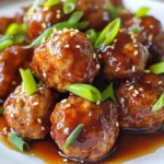 To make teriyaki turkey meatballs, you need simple and fresh ingredients. Here’s what you will use: - 1 lb ground turkey - ¼ cup breadcrumbs (preferably panko) - 1 large egg - 2 green onions, finely chopped - 3 cloves garlic, minced - 1 tablespoon ginger, grated - ¼ cup soy sauce (or tamari for gluten-free) - 2 tablespoons honey - 1 tablespoon rice vinegar - 1 teaspoon sesame oil - Salt and pepper to taste - Sesame seeds, for garnish - Extra green onions, for garnish These ingredients blend to give the meatballs a rich flavor. You can add some optional ingredients to heighten the taste of your meatballs: - Crushed red pepper flakes for heat - Fresh cilantro for a fresh twist - Pineapple chunks for sweetness - Chopped bell peppers for extra crunch These ingredients can make your meatballs even more exciting. If you have dietary needs, you can easily tweak the recipe: - Use ground chicken instead of turkey for a lighter option. - For a gluten-free version, replace soy sauce with tamari. - If you avoid eggs, try using flaxseed meal mixed with water as a binder. These substitutions allow everyone to enjoy this tasty dish. {{ingredient_image_1}} Start with a large bowl. Add 1 pound of ground turkey. Next, add ¼ cup of breadcrumbs. I prefer panko for a crispier texture. Crack in 1 large egg. Then, toss in 2 finely chopped green onions, 3 minced garlic cloves, and 1 tablespoon of grated ginger. Mix everything well using your hands. You want a uniform mixture. Season with salt and pepper to your taste. Form the mixture into meatballs, about 1 inch in diameter. Heat a large skillet over medium heat. Add a small drizzle of oil. Place the meatballs in the skillet in batches. Avoid overcrowding the pan. Cook them for about 8 to 10 minutes. Turn them occasionally to brown on all sides. Ensure they are cooked through. You can test a meatball by cutting one in half. It should be no longer pink inside. While the meatballs cook, prepare the teriyaki sauce. In a small bowl, whisk together ¼ cup of soy sauce, 2 tablespoons of honey, 1 tablespoon of rice vinegar, and 1 teaspoon of sesame oil. Mix until smooth. Once the meatballs are browned, pour the teriyaki sauce over them in the skillet. Reduce the heat to low. Let them simmer for about 5 to 7 minutes. This allows the sauce to thicken and coat the meatballs. Afterward, carefully remove the meatballs from the skillet. Place them on a serving dish. Drizzle any remaining sauce on top. Finish with sesame seeds and extra chopped green onions for garnish. To make juicy meatballs, start with ground turkey that has some fat. I like to use 93% lean turkey. Add breadcrumbs to keep moisture in, and don’t overmix. When forming the meatballs, handle them gently. This helps keep air pockets in the meat. Cook them in batches, giving them space in the pan. This avoids steaming and keeps them juicy. One mistake is overcrowding the pan. It causes the meatballs to steam instead of brown. Another error is cooking them too fast on high heat. This can burn the outside while leaving the inside raw. Also, do not skip the resting time after cooking. This helps the juices settle back into the meatballs, making them more flavorful. Teriyaki turkey meatballs go well with rice or quinoa. Serve them on a bed of steamed veggies for color and nutrition. You can also pair them with a simple salad. A light dressing complements the sweet teriyaki sauce. For a fun twist, try them in a sandwich or wrap. They stay tasty and are easy to share! Pro Tips Use Cold Ingredients: Ensure your ground turkey and egg are cold when mixing, as this helps the meatballs hold their shape during cooking. Don’t Overmix: When combining ingredients, mix just until everything is incorporated to avoid tough meatballs. Check Doneness: Use a meat thermometer to check if the meatballs have reached an internal temperature of 165°F (74°C) for safety. Let It Rest: Allow the meatballs to rest for a few minutes after cooking to let the juices redistribute, making them more flavorful and moist. {{image_2}} If you want a gluten-free option, use tamari instead of soy sauce. Tamari tastes similar but has no gluten. You can also swap panko breadcrumbs for gluten-free breadcrumbs. This keeps the meatballs light and tender without the gluten. To add heat, mix in some chili flakes or sriracha. I suggest starting with half a teaspoon. This small change brings a kick to the teriyaki sauce. You can also add jalapeños or diced hot peppers to the meatball mix. This makes a flavorful twist that spicy food lovers will enjoy. You can change the taste of your meatballs by adding different herbs and spices. Try adding some chopped cilantro or basil for a fresh taste. For a smoky flavor, mix in smoked paprika. You can even use curry powder for a fun twist. Each variation brings new life to your meatballs. Experiment and find your favorite! To keep your leftover teriyaki turkey meatballs fresh, place them in an airtight container. Make sure to let them cool first. Store the container in your fridge. They will stay good for 3 to 4 days. If you want to enjoy them later, freezing is a great option. You can freeze the meatballs to enjoy later. Start by letting them cool completely. Then, place them in a single layer on a baking sheet. Freeze them for about 1 hour. Once they are firm, transfer the meatballs to a freezer-safe bag. Press out any extra air and seal it tightly. They can last up to 3 months in the freezer. When you’re ready to eat your meatballs, reheating them properly is key. You can use the stove or the microwave. For the stove, place them in a skillet with a splash of water or sauce. Heat them on medium until warm. For the microwave, cover the meatballs with a damp paper towel. Heat them in short bursts, checking every 30 seconds. Both methods will keep them moist and tasty. Yes, you can use ground chicken or beef. Both options work well. Ground chicken has a light taste, similar to turkey. Beef adds a richer flavor. Just keep in mind that cooking times might change slightly. Always check for doneness. The best way to check is by using a meat thermometer. The center should reach 165°F. If you don't have one, cut a meatball in half. The meat should be no longer pink. Juices should run clear. This means they are safe to eat. These meatballs pair great with rice or noodles. You can also serve them with steamed vegetables or a salad. For a fun twist, try them in a wrap or as a slider. They are tasty and versatile! This blog post gives you a clear guide to making teriyaki turkey meatballs. You learned about the main and optional ingredients, plus substitutions for diets. I shared step-by-step instructions for preparing, cooking, and making the sauce. Tips helped you avoid common mistakes and suggested great pairings. You explored variations for unique flavors and gluten-free options. Lastly, I covered how to store, freeze, and reheat leftovers. Now, you can enjoy delicious teriyaki turkey meatballs any time. It's your turn to get cooking!