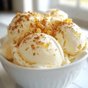 To make gingerbread ice cream, gather these simple items: - 2 cups heavy cream - 1 cup whole milk - ¾ cup granulated sugar - 1 tablespoon vanilla extract - 1 tablespoon ground ginger - 1 tablespoon ground cinnamon - ½ teaspoon ground nutmeg - ¼ teaspoon ground cloves - ¼ cup molasses - ½ cup finely chopped crystallized ginger (optional) - Pinch of salt You may need substitutes if you can't find some items. Here are a few tips: - For heavy cream, use coconut cream for a dairy-free option. - Substitute whole milk with almond milk or oat milk. - Instead of granulated sugar, try brown sugar for a richer flavor. - If you don't have crystallized ginger, use fresh ginger. Just chop it finely. Choosing fresh ingredients makes a big difference in taste. Here are my tips: - Look for cream that is thick and rich. Check the date to ensure freshness. - Whole milk should be creamy, not watery. It should smell fresh. - Choose spices that are fragrant. Old spices lose their flavor. - Check molasses for a rich color and thick texture. - If using crystallized ginger, pick pieces that are soft, not hard or dry. {{ingredient_image_1}} To make the ice cream base, start with a large mixing bowl. Combine 2 cups of heavy cream and 1 cup of whole milk. Whisk them together until they blend well. Next, add ¾ cup of granulated sugar, 1 tablespoon of vanilla extract, and the spices: 1 tablespoon of ground ginger, 1 tablespoon of ground cinnamon, ½ teaspoon of ground nutmeg, and ¼ teaspoon of ground cloves. Don’t forget a pinch of salt! Stir this mixture well until the sugar dissolves. If you like, fold in ½ cup of finely chopped crystallized ginger for texture and extra flavor. Once your base is ready, pour it into your ice cream maker. Churn the mixture according to the manufacturer’s instructions. This process usually takes about 20 to 30 minutes. You will know it’s ready when it reaches a soft-serve consistency. It should look thick and creamy. After churning, transfer the ice cream into an airtight container. Smooth the top with a spatula to make it nice and neat. Cover it well and freeze for at least 4 hours. If you wait longer, it will firm up even more! When ready to serve, scoop the gingerbread ice cream into bowls. You can top it with crushed ginger snaps or a drizzle of chocolate sauce for a fun twist. Enjoy this creamy holiday delight! One big mistake is not mixing your ingredients enough. Always blend the cream and milk first. Make sure the sugar dissolves fully. If you skip this step, the ice cream may not taste sweet. Another error is over-churning the ice cream. Churn it just until it's soft-serve texture, then freeze. If you churn too long, it may turn icy. To get that smooth, creamy texture, use cold ingredients. Make sure your cream and milk are chilled before mixing. This helps the ice cream freeze evenly. Adding a pinch of salt brings out the flavors, too. If you want a richer taste, use more heavy cream than milk. A little extra molasses also adds creaminess and a nice depth. For a fun presentation, scoop the ice cream into festive bowls. You can sprinkle a bit of ground cinnamon on top for a pop of color. Crushed gingerbread cookies make great toppings! You can also drizzle warm caramel or chocolate sauce over it. Serve with a slice of gingerbread cake on the side for a true holiday treat. Pro Tips Chill Your Ingredients: Make sure to chill your heavy cream and milk in the refrigerator for a few hours before starting. This helps the ice cream churn faster and results in a creamier texture. Use Fresh Spices: For the best flavor, use freshly ground spices instead of pre-ground ones. This enhances the aroma and taste of your gingerbread ice cream. Don't Over-Churn: Be careful not to over-churn your ice cream. Churn just until you reach a soft-serve consistency to avoid a grainy texture. Mix-In Variations: Experiment with different mix-ins like crushed cookies, nuts, or chocolate chips for added flavor and texture. Just fold them in gently before freezing. {{image_2}} You can make gingerbread ice cream even more fun with add-ins. Here are a few ideas: - Chopped nuts: Walnuts or pecans add a nice crunch. - Chocolate chips: Dark or white chocolate chips give a sweet twist. - Caramel swirls: Drizzle caramel sauce right before freezing for a rich flavor. - Dried fruits: Raisins or cranberries add a chewy texture. Mix and match these add-ins to find your favorite combo. They can make each scoop unique! Want to make this recipe dairy-free? No problem! Here’s how: - Coconut cream: Use full-fat coconut milk instead of heavy cream. - Almond milk: Swap whole milk with almond or oat milk. - Maple syrup: Replace granulated sugar with maple syrup for sweetness. These swaps keep the gingerbread flavor while making it vegan-friendly. You can enjoy this treat with a clear conscience! You can change the spice level to suit your taste. Want it spicier? Add more ground ginger or cinnamon. Start with an extra half teaspoon and taste as you go. If you prefer less spice, reduce the ginger and cinnamon by half. Experimenting with spices lets you make gingerbread ice cream just right for you. It’s all about your taste! To keep your gingerbread ice cream fresh, store it in an airtight container. This will prevent ice crystals from forming. Make sure to smooth the top with a spatula before sealing it. This helps keep the texture smooth and creamy. Gingerbread ice cream lasts about two weeks in the freezer. After that, the flavor may fade. For the best taste, aim to eat it within the first week. Always check for off smells or ice crystals before serving. If you have leftovers, you can re-freeze the ice cream. Just make sure it stays in the airtight container. When you're ready to eat it again, let it sit at room temperature for a few minutes. This will make it easier to scoop. If it gets too hard, you can stir it gently to restore some creaminess. Yes, you can make gingerbread ice cream without an ice cream maker. You need a few simple steps. First, create the ice cream base as usual. Then, pour it into a shallow dish. Place it in the freezer. Every 30 minutes, stir the mixture with a fork for about 3 hours. This helps break up ice crystals and makes it creamy. To boost the ginger flavor, try adding more ground ginger. Start with an extra half-teaspoon. You can also use fresh ginger. Grate about one tablespoon of fresh ginger and mix it in. This adds a bold taste. For a fun twist, add some chopped crystallized ginger. It gives a nice chew and extra spice. Gingerbread ice cream pairs well with many treats. I love serving it with warm gingerbread cookies. You can also try it with a drizzle of caramel sauce or chocolate syrup. For a festive touch, add whipped cream and a sprinkle of cinnamon. Crushed nuts or holiday sprinkles also make great toppings. This article explored the key steps to create gingerbread ice cream. First, we covered the essential ingredients and their substitutes. Next, I walked you through making the base, churning, and freezing. I shared tips for avoiding common mistakes and achieving a creamy texture. We also discussed fun variations and how to store your ice cream for fresh enjoyment. In summary, making gingerbread ice cream is an exciting process. With these tips, you can enjoy a delicious treat anytime.